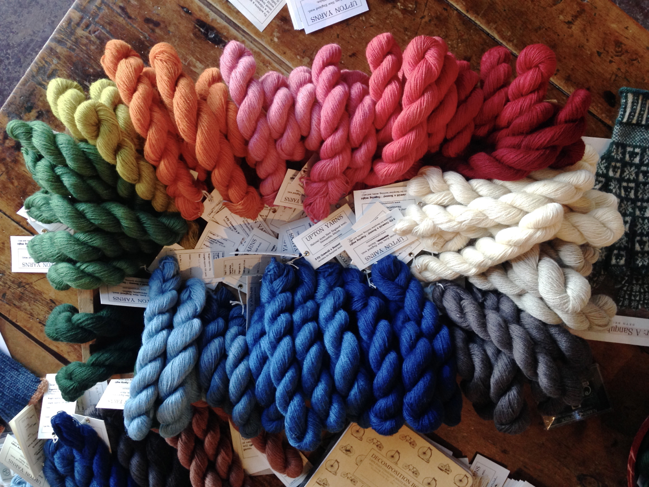 A rainbow of 3-Ply Cotswold x Romney fingering weight. I took this photo rather late in the day. By this point I had sold out of at least four colors. 
