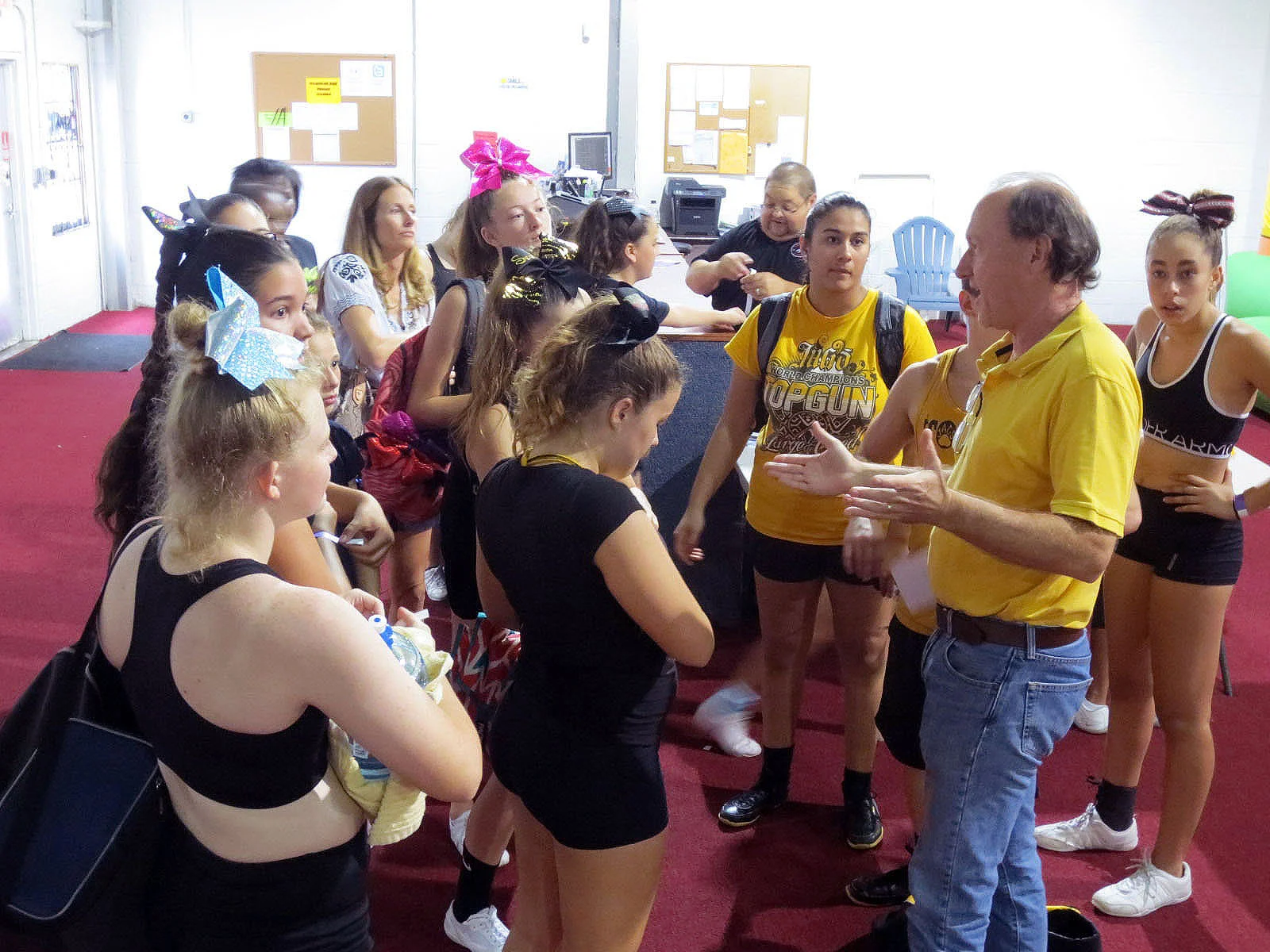 Peter Volum welcomes a gymnastics group to the facility.