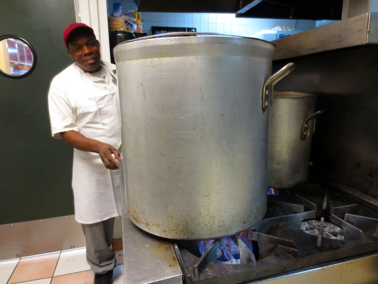 25-year veteran Chef Gerard Francois monitors the matzo ball soup