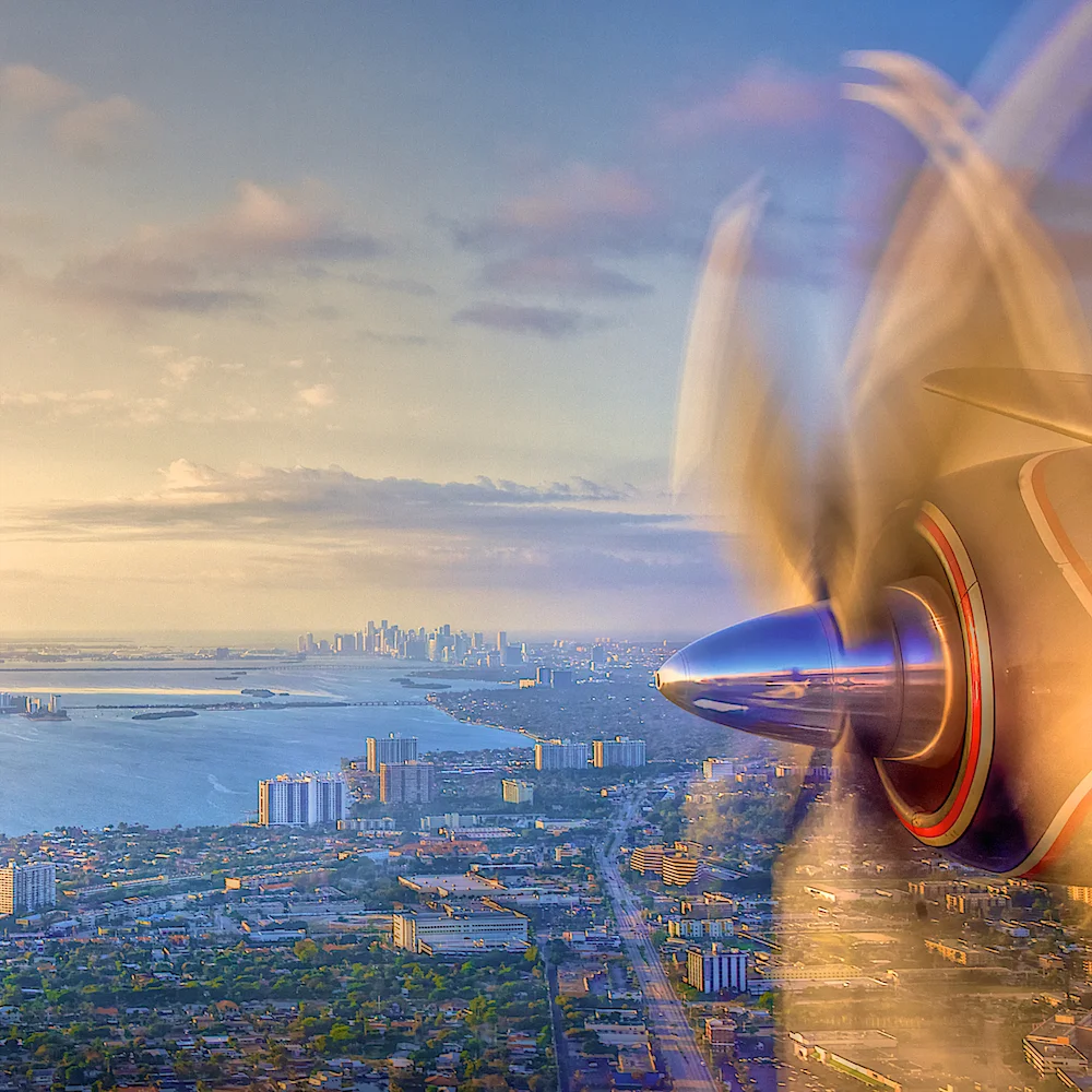 Over Miami in a vintage plane once piloted by his father