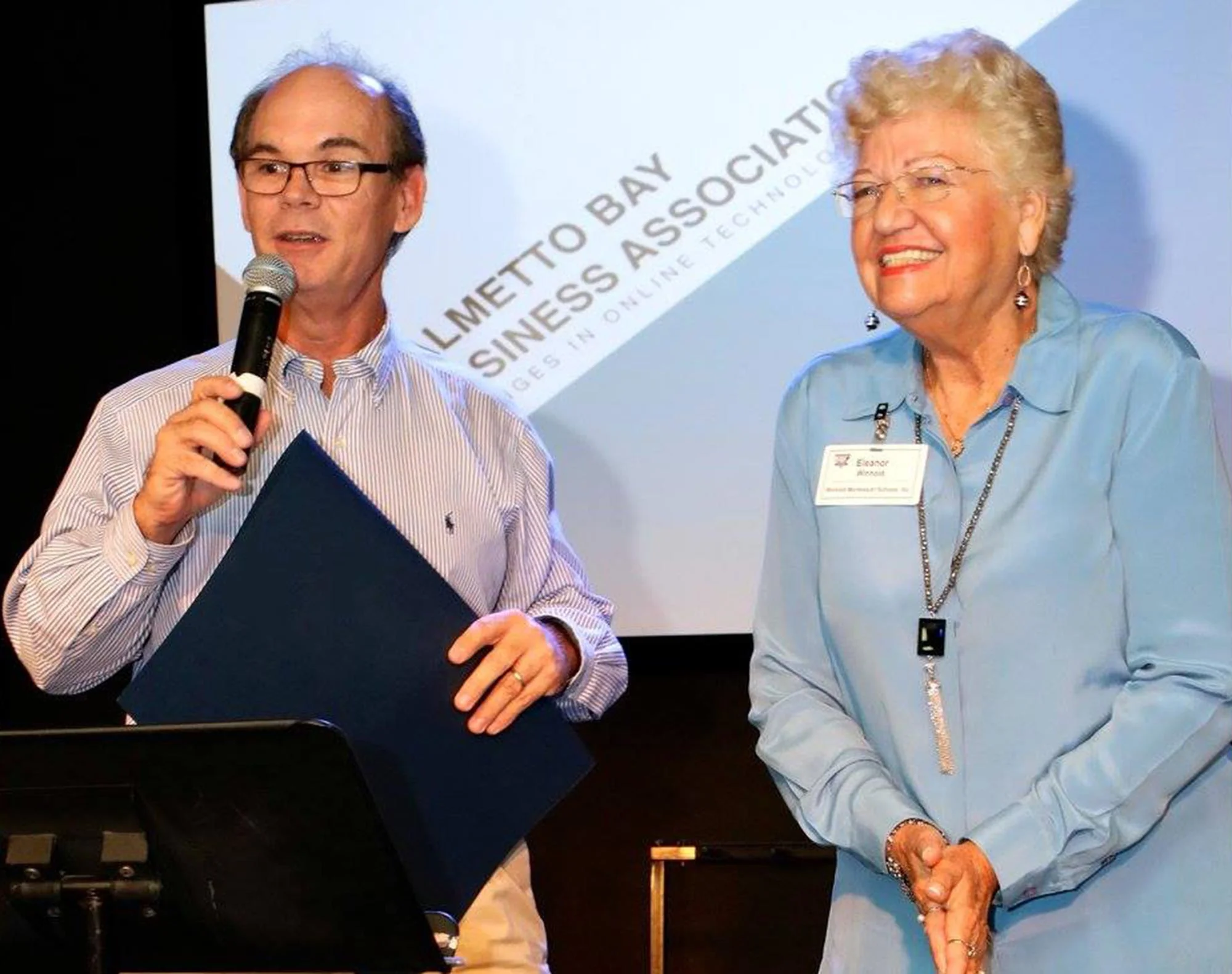 Mayor Flinn provides Winhold with proclamation for her work (January 2016)
