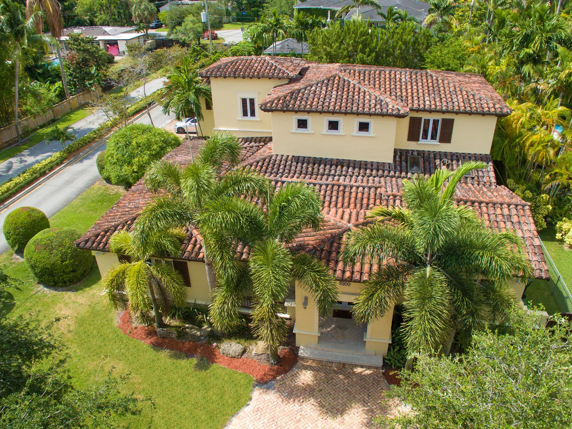 MiamiHal, top agent in South Miami, takes his drone up for a lofty photo of this wonderful estate.