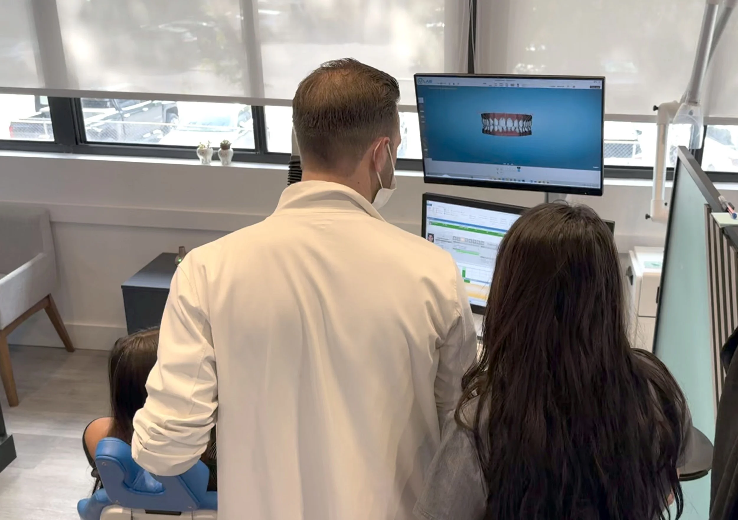 Dr. Ross with a patient