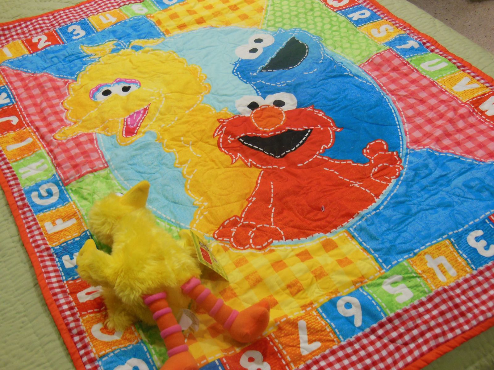Sesame Street Crib Quilt and Big Bird.jpg