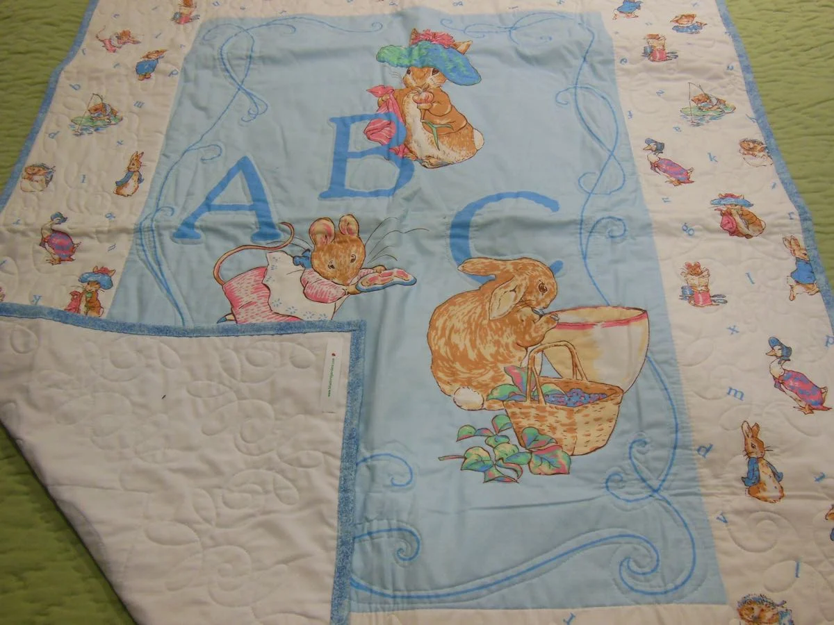 Peter Rabbit Crib Quilt front and back.jpg