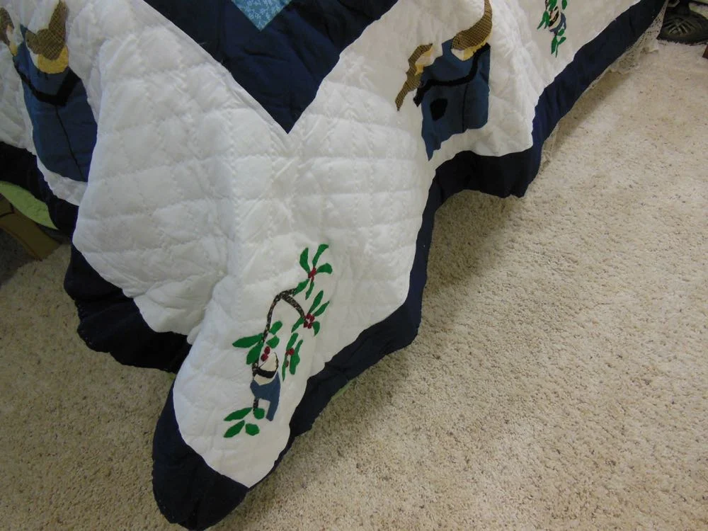 Birds applique king quilt at Bluebird Gardens