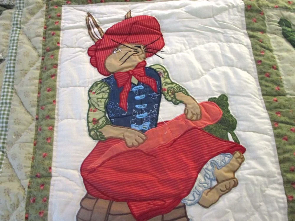 Rabbits in Garden Lap Quilt Wall Hanging from Bluebird Gardens USA