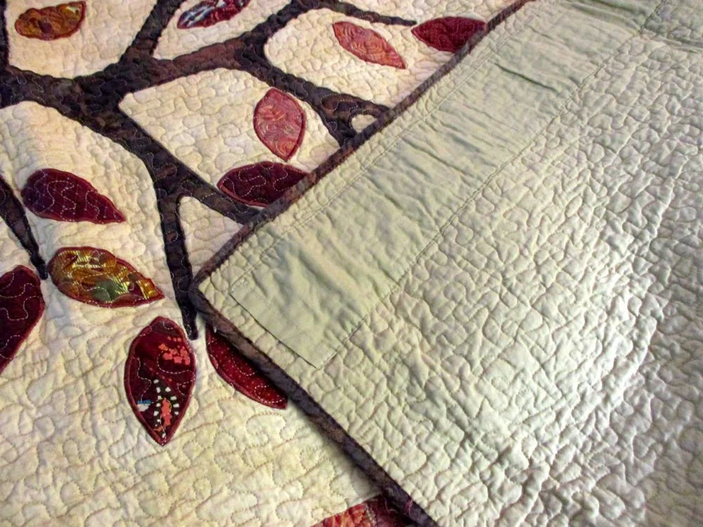 TREE OF LIFE LAP QUILT THROW WITH A HANGING SLEEVE ON BACK
