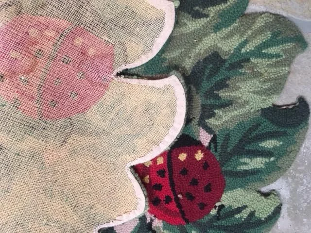 Ladybugs rug back from Bluebird Gardens
