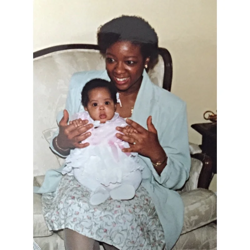 My godmother and me getting familiar in 1991.