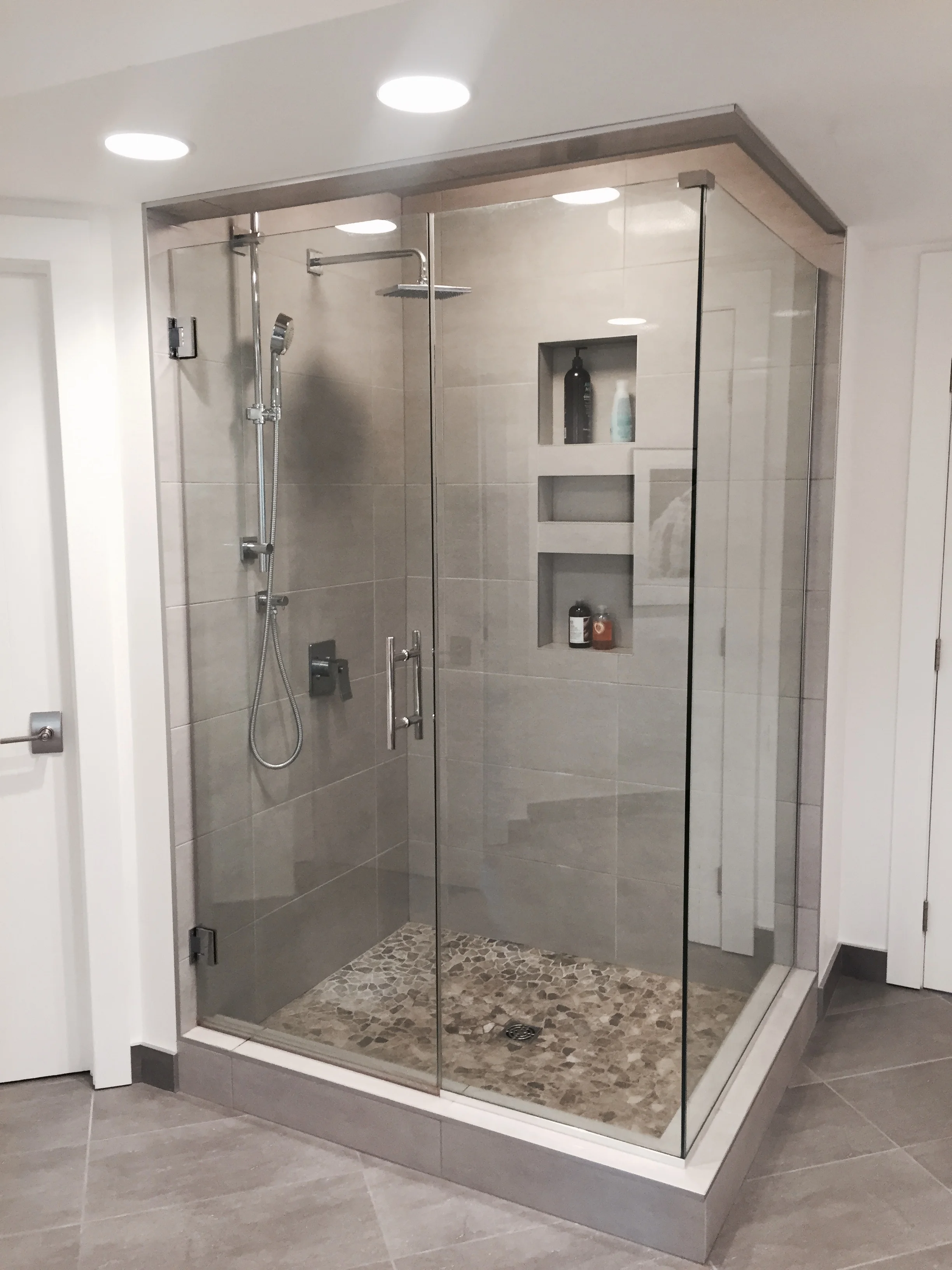 Villa+Avenue+Master+Bathroom+Shower+Pebbles.jpg