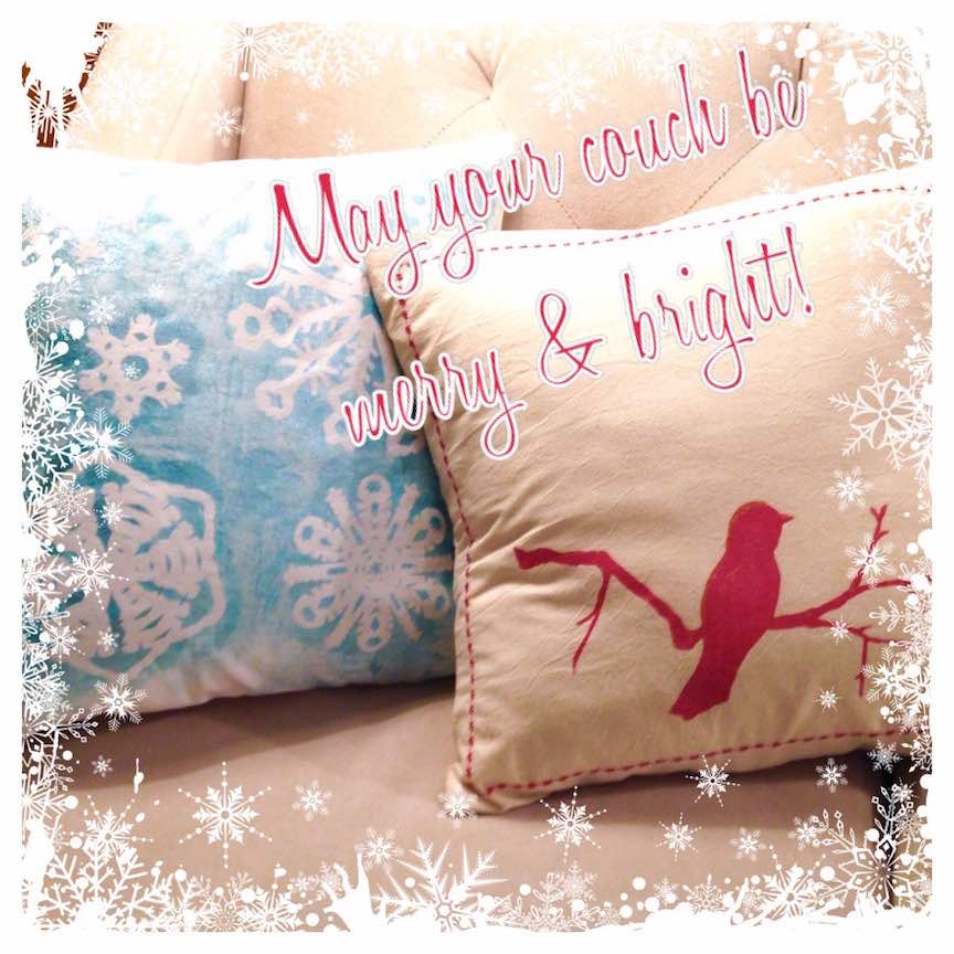 Snowflake reverse-stenciled pillow cover, red bird stenciled pillow cover with decorative stitching.