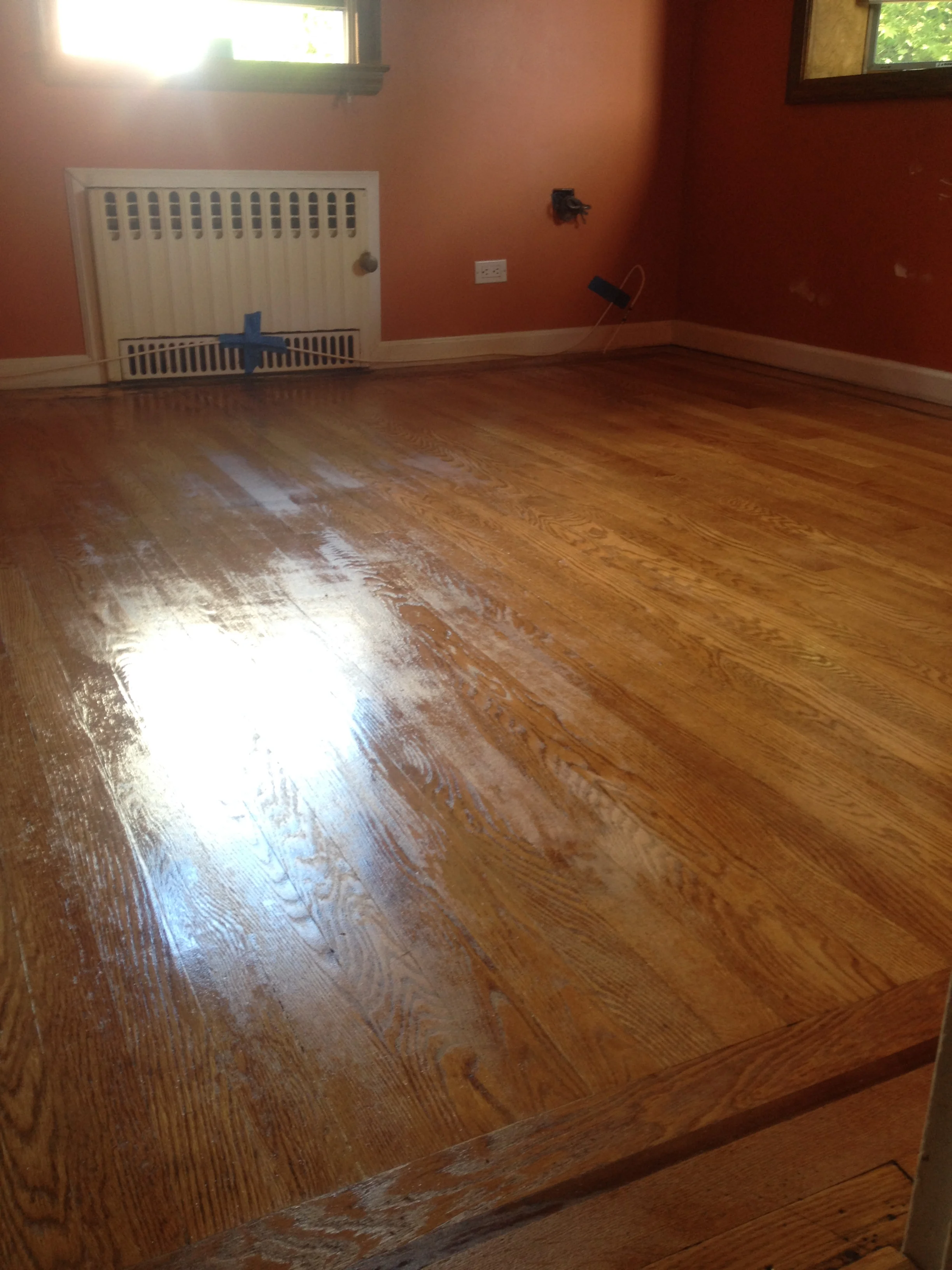 The wooden floor with the stain and sealant