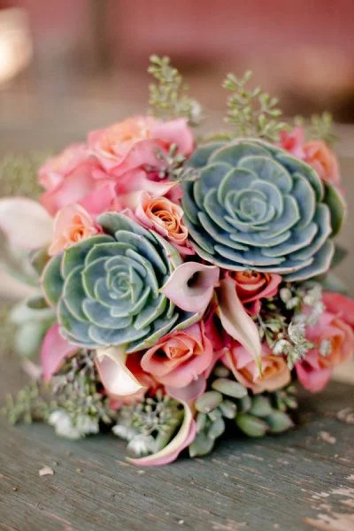 This succulent and flower combo bouquet is BEAUTIFUL