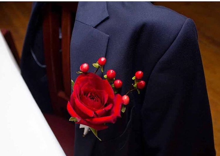 Groomsmen boutonniere photo provided by DPSnapsphotography