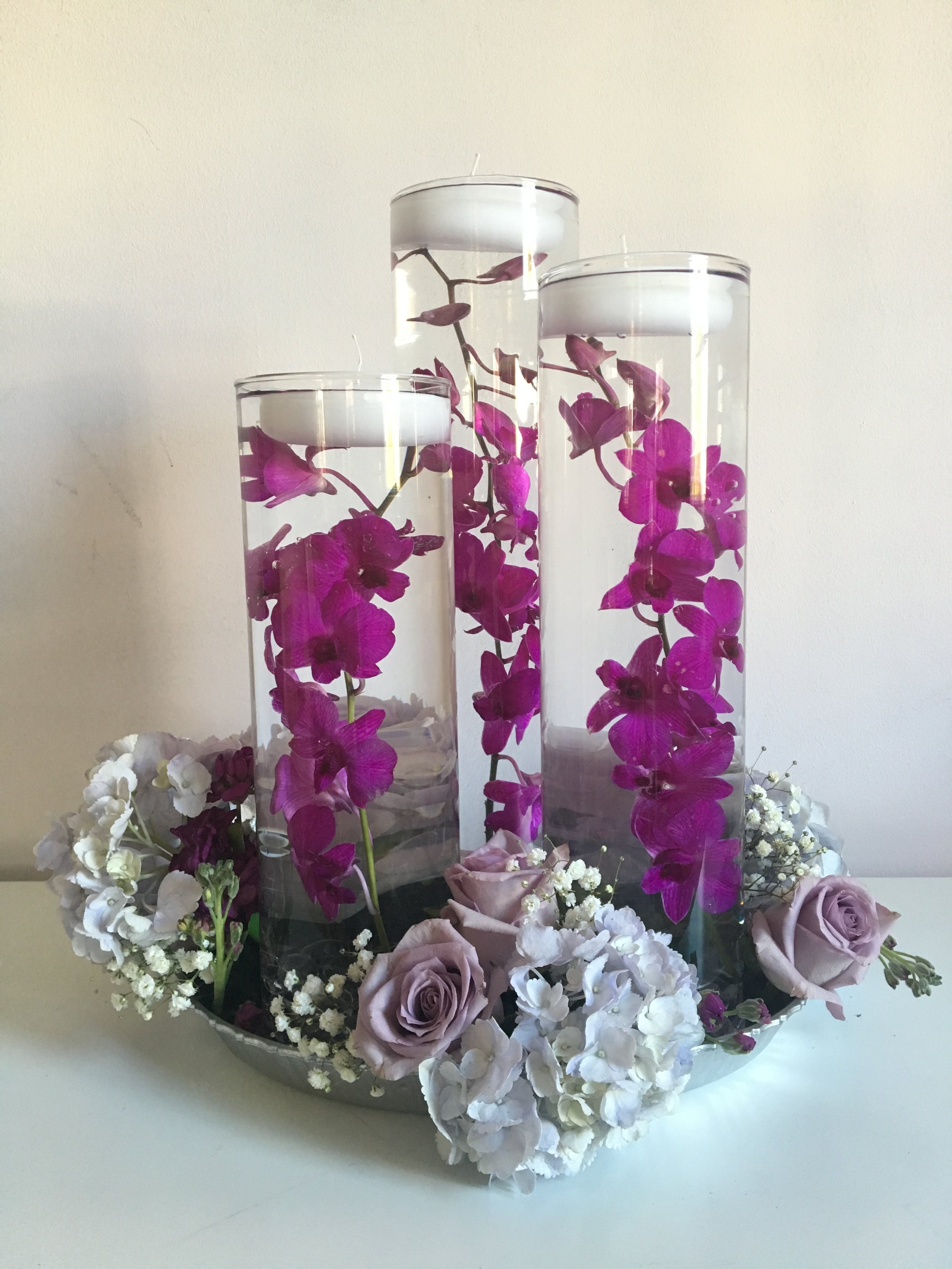 Evelisa Floral & Design: Floating candle arrangement