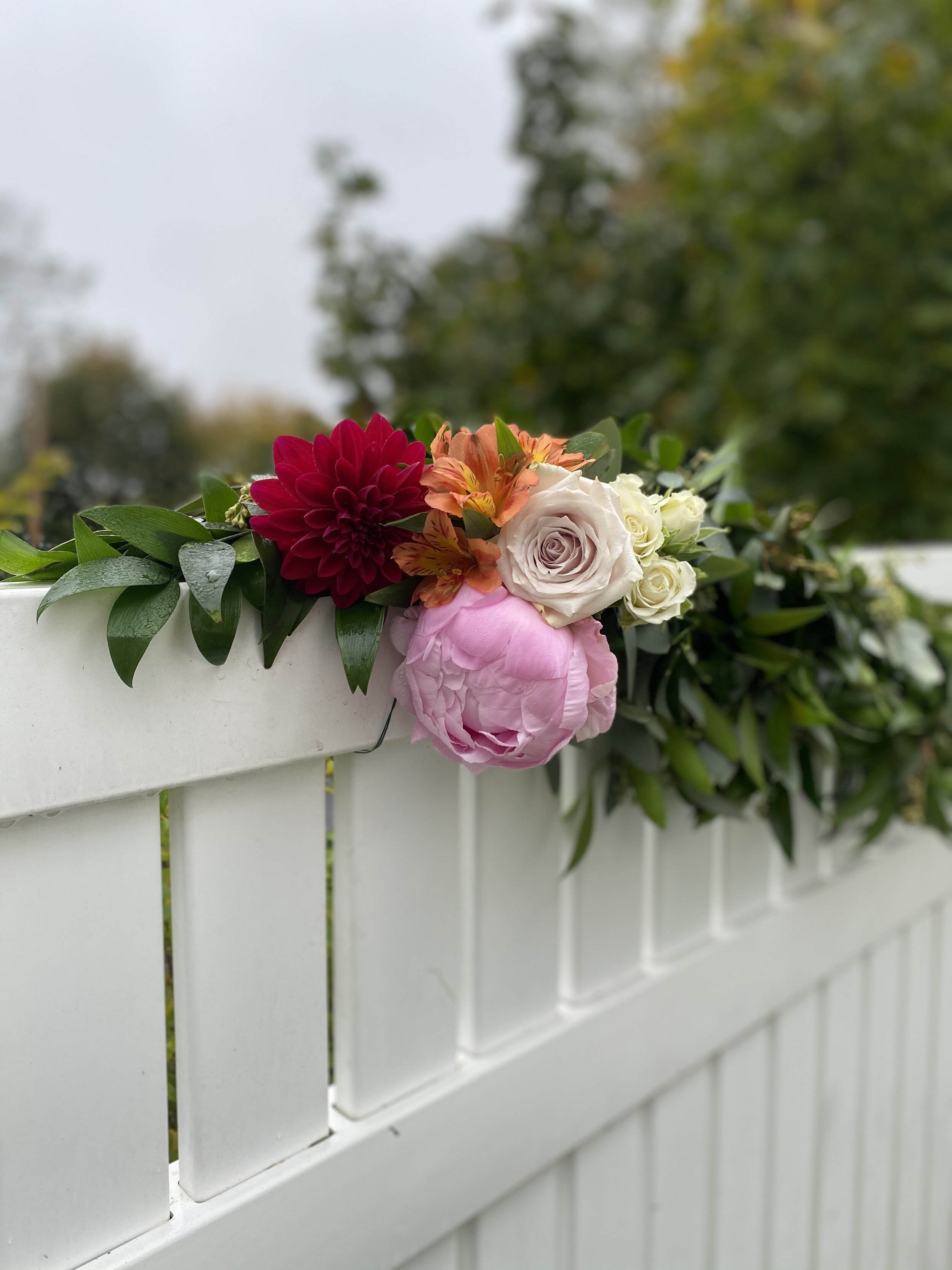 Evelisa Floral &amp; Design closeup out door garland