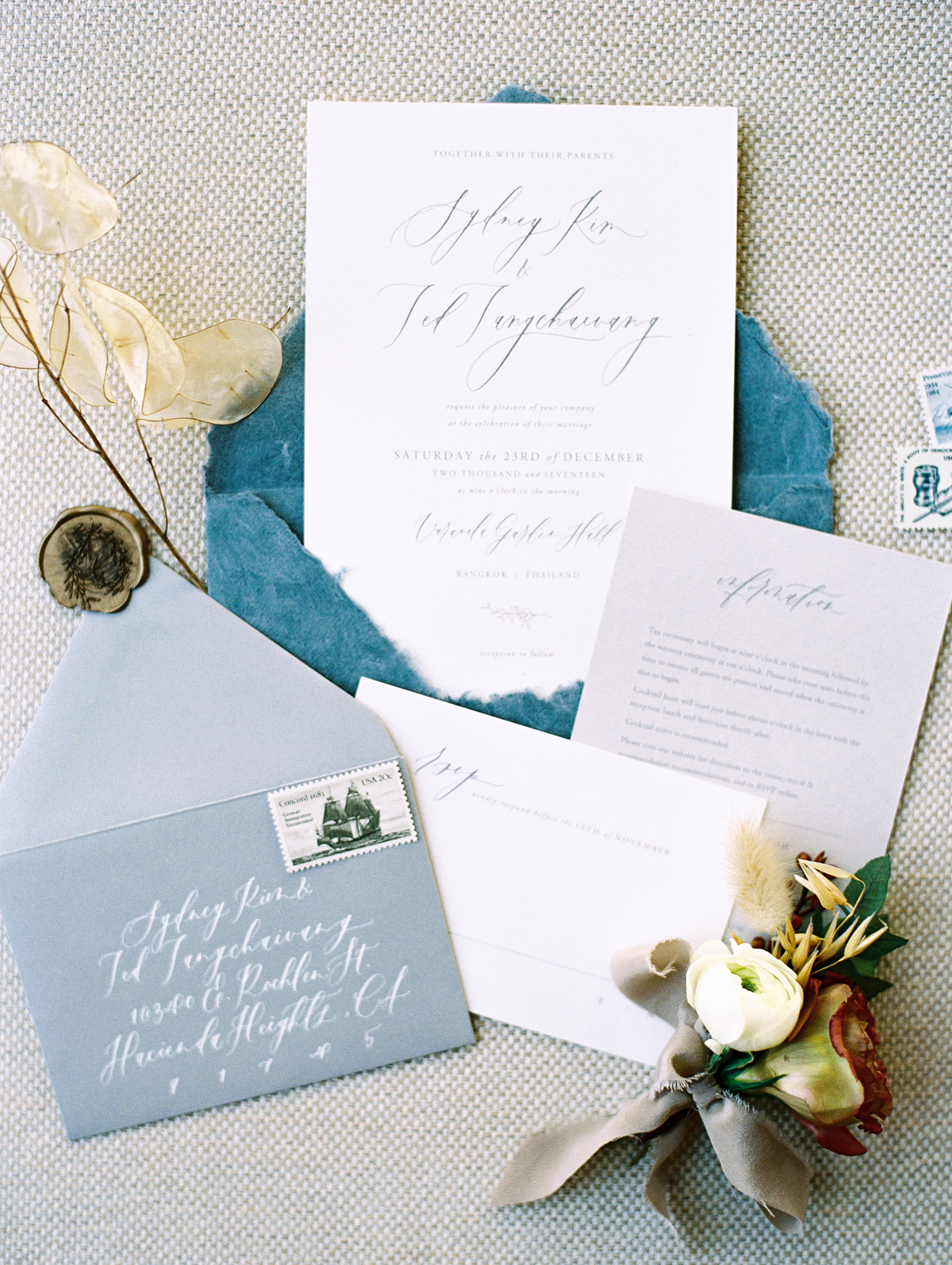 custom invitation suite with floral details