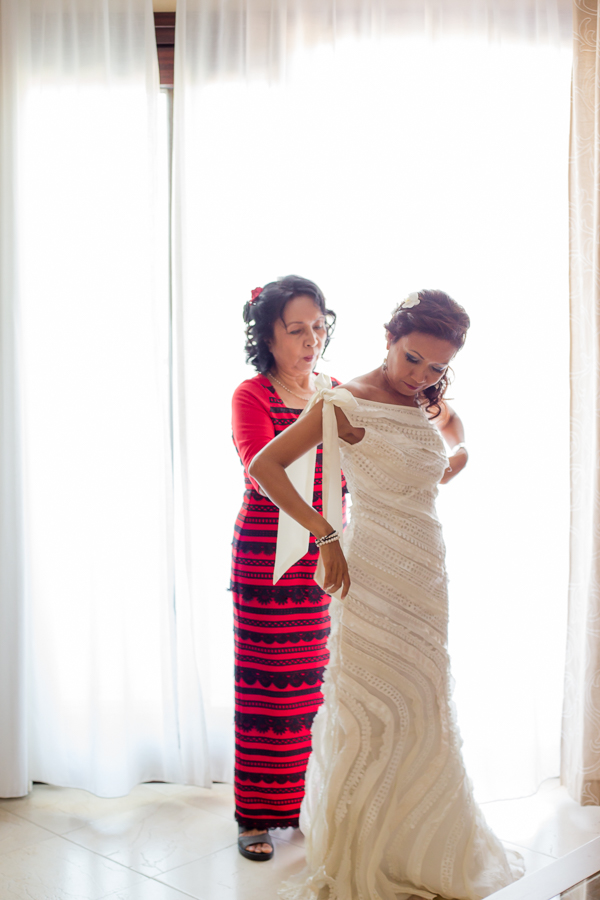 the bride and her mother get ready