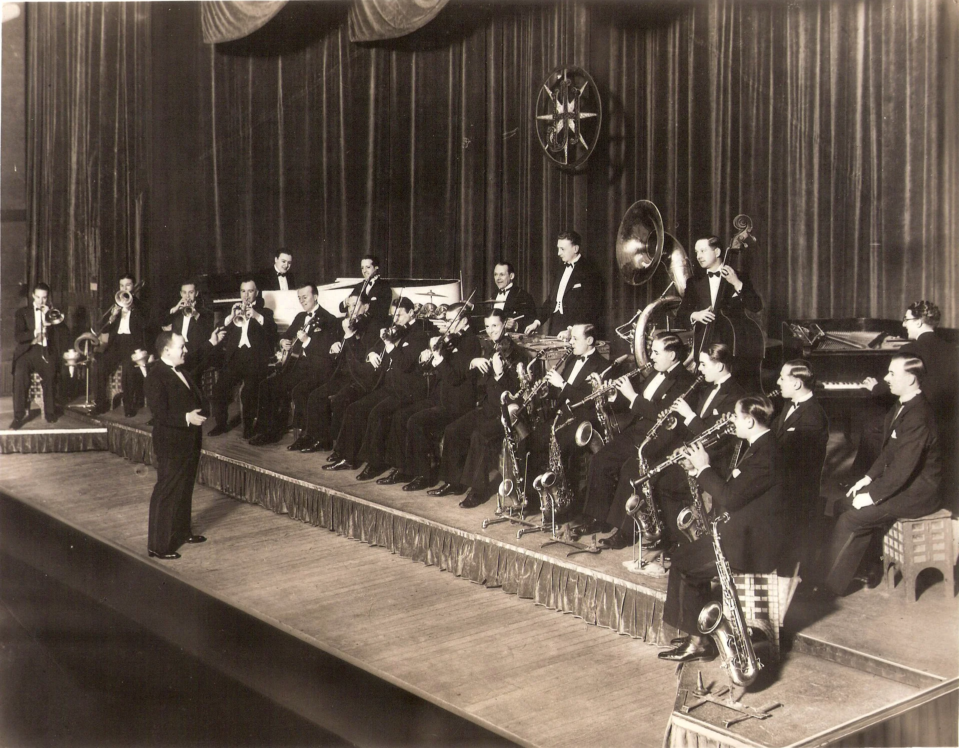 An expanding band captured on stage.