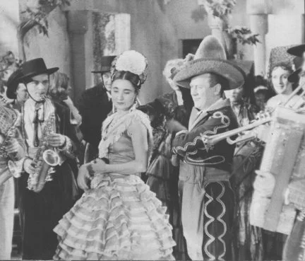 A still from the film "She Shall Have Music"