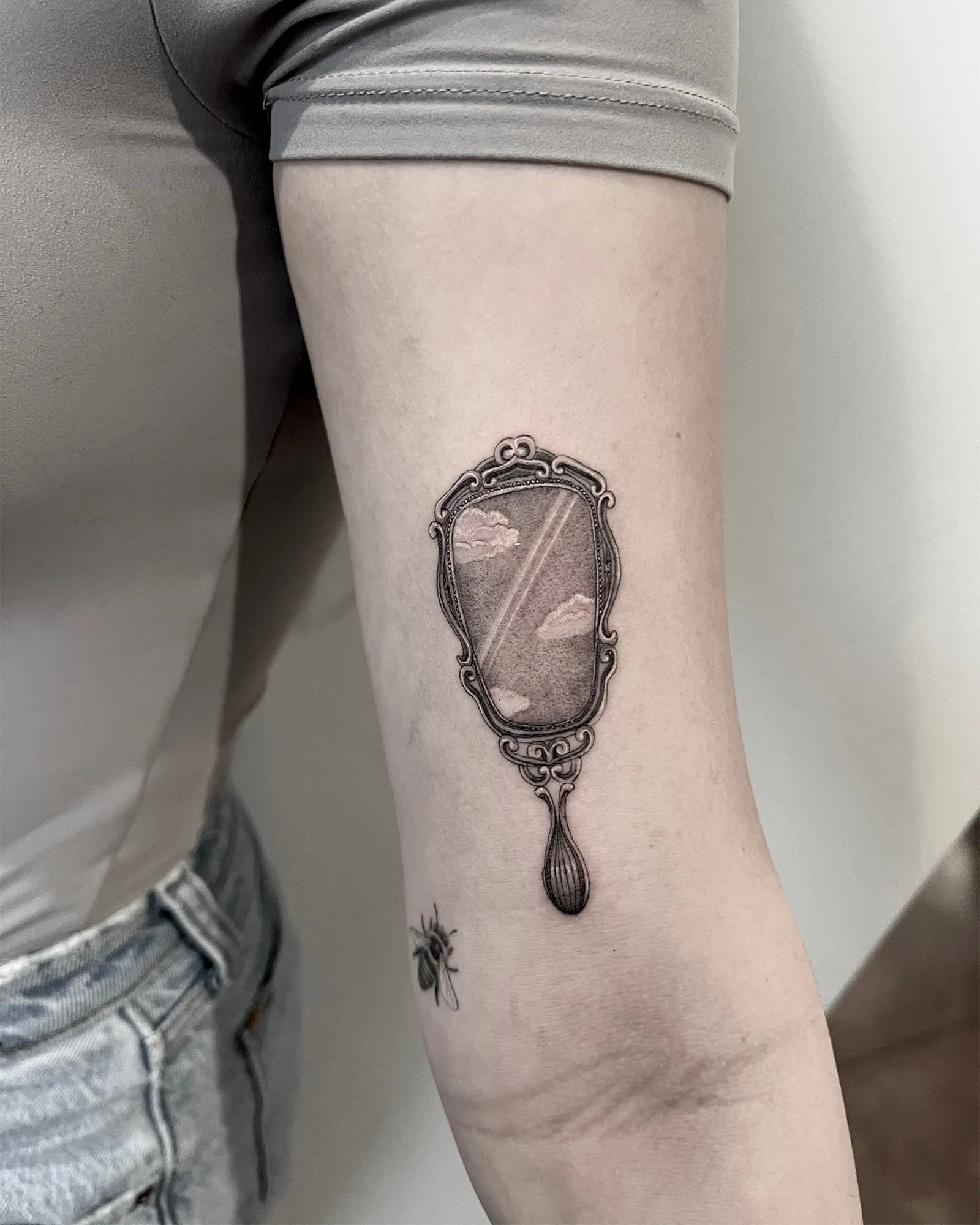 maddie-stanaland-black-grey-fine-line-mirror-tattoo-daphne-alabama.jpg