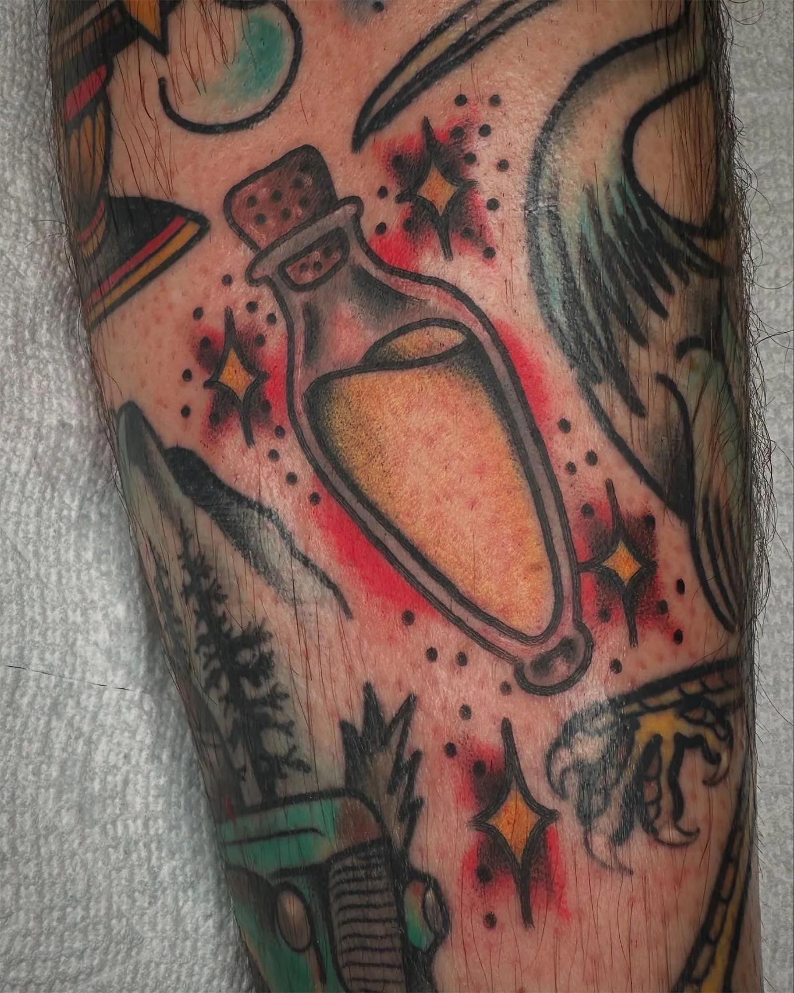 pat-duval-american-traditional-potion-bottle-tattoo-daphne-alabama.jpg