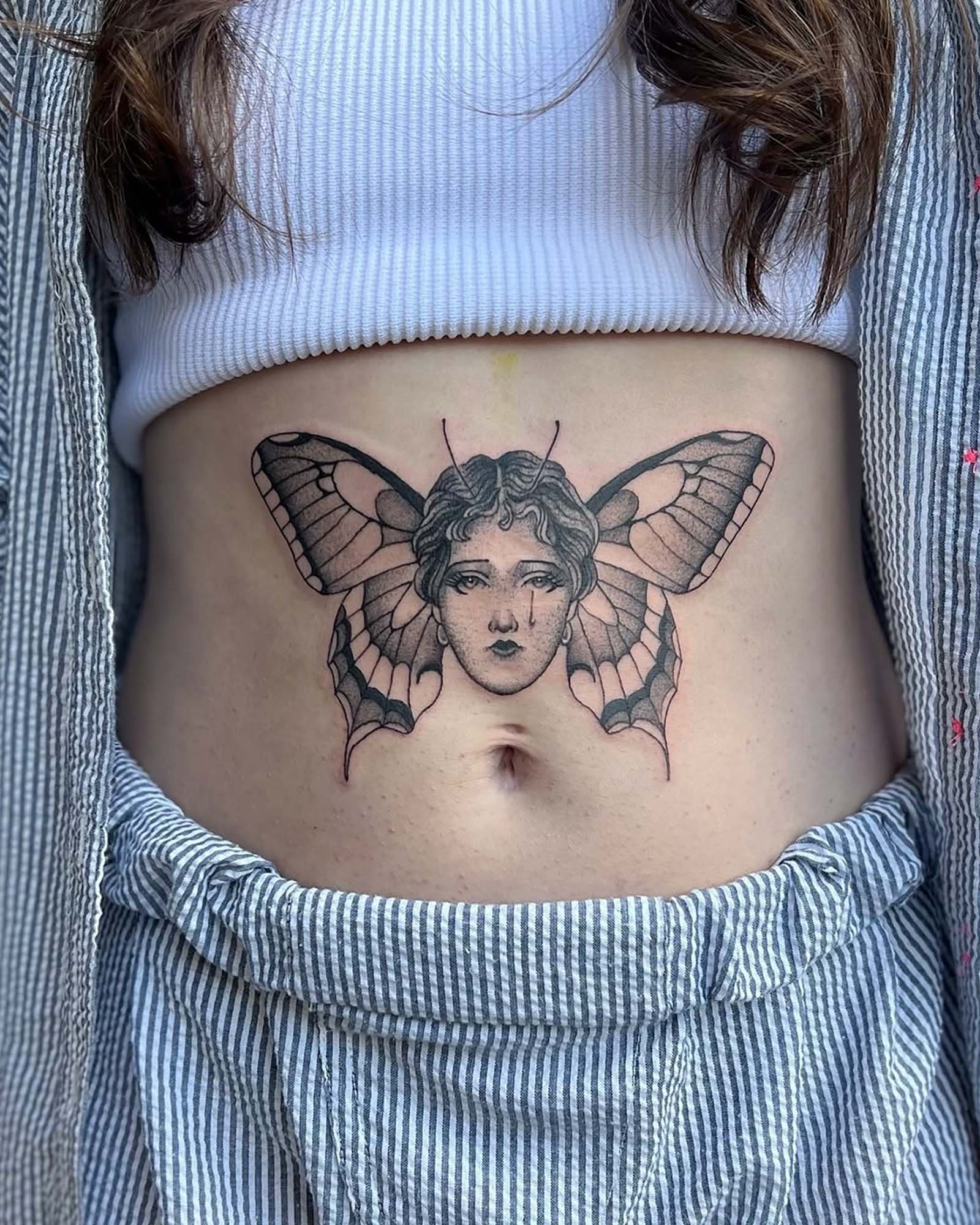 peter-anderson-black-grey-butterfly-stomach-tattoo-daphne-alabama.jpg