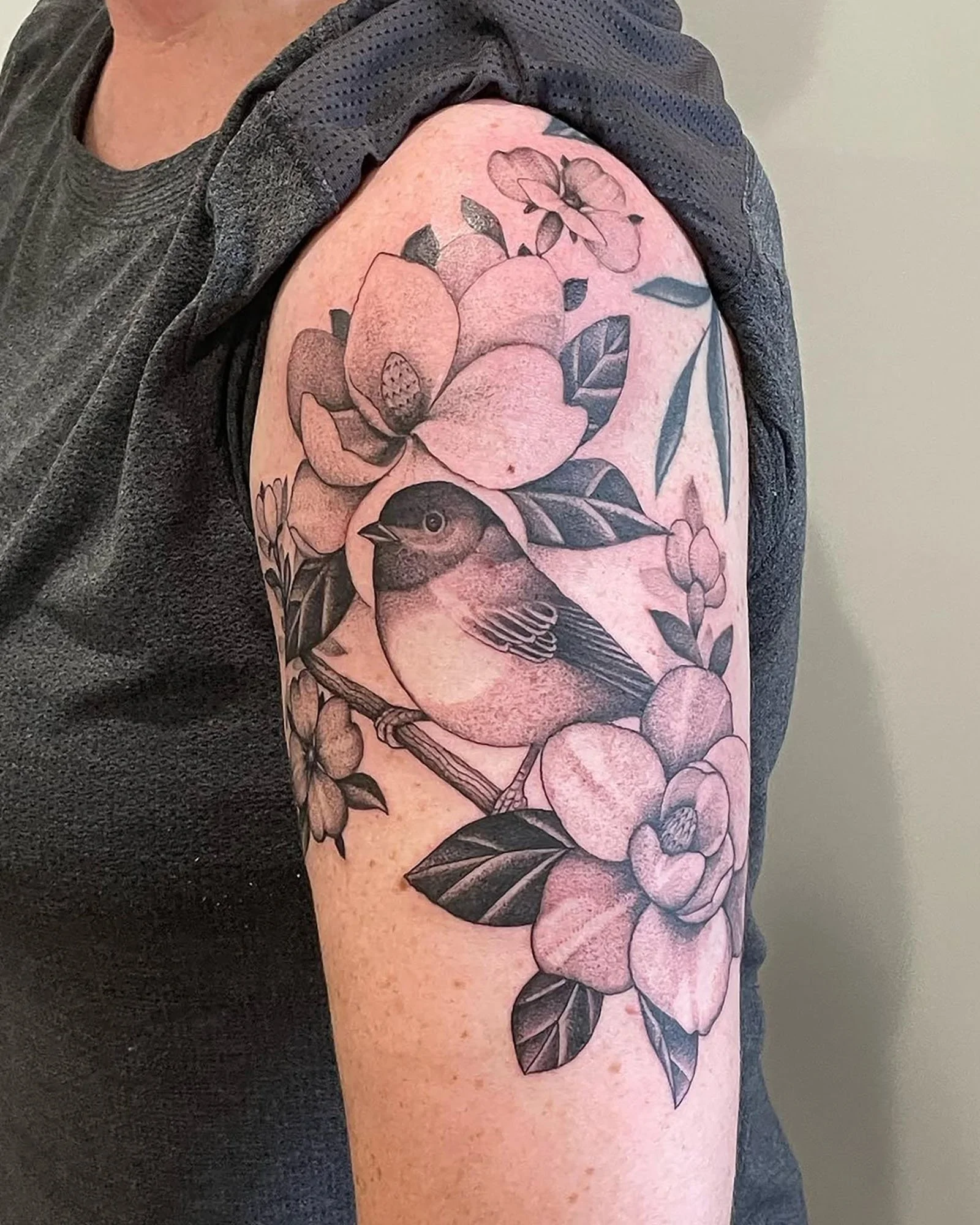 peter-anderson-black-grey-bird-and-flowers-arm-tattoo-daphne-alabama.jpg