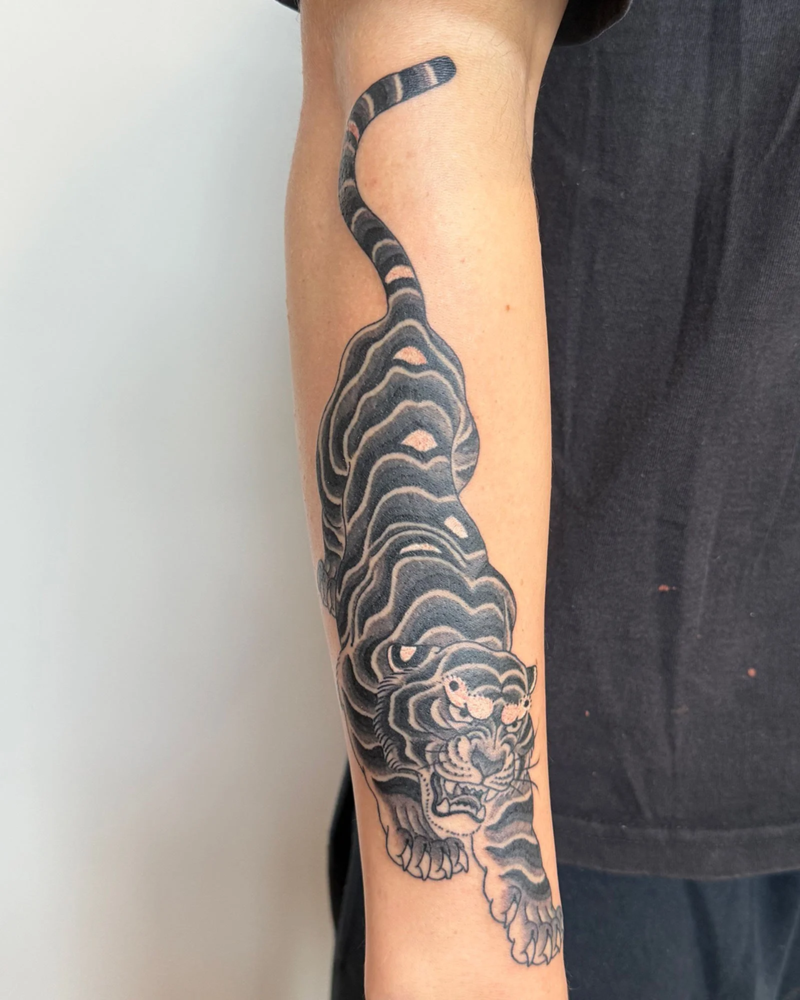 robert-johnson-japanese-traditional-tiger-forearm-tattoo-daphne-alabama.jpg