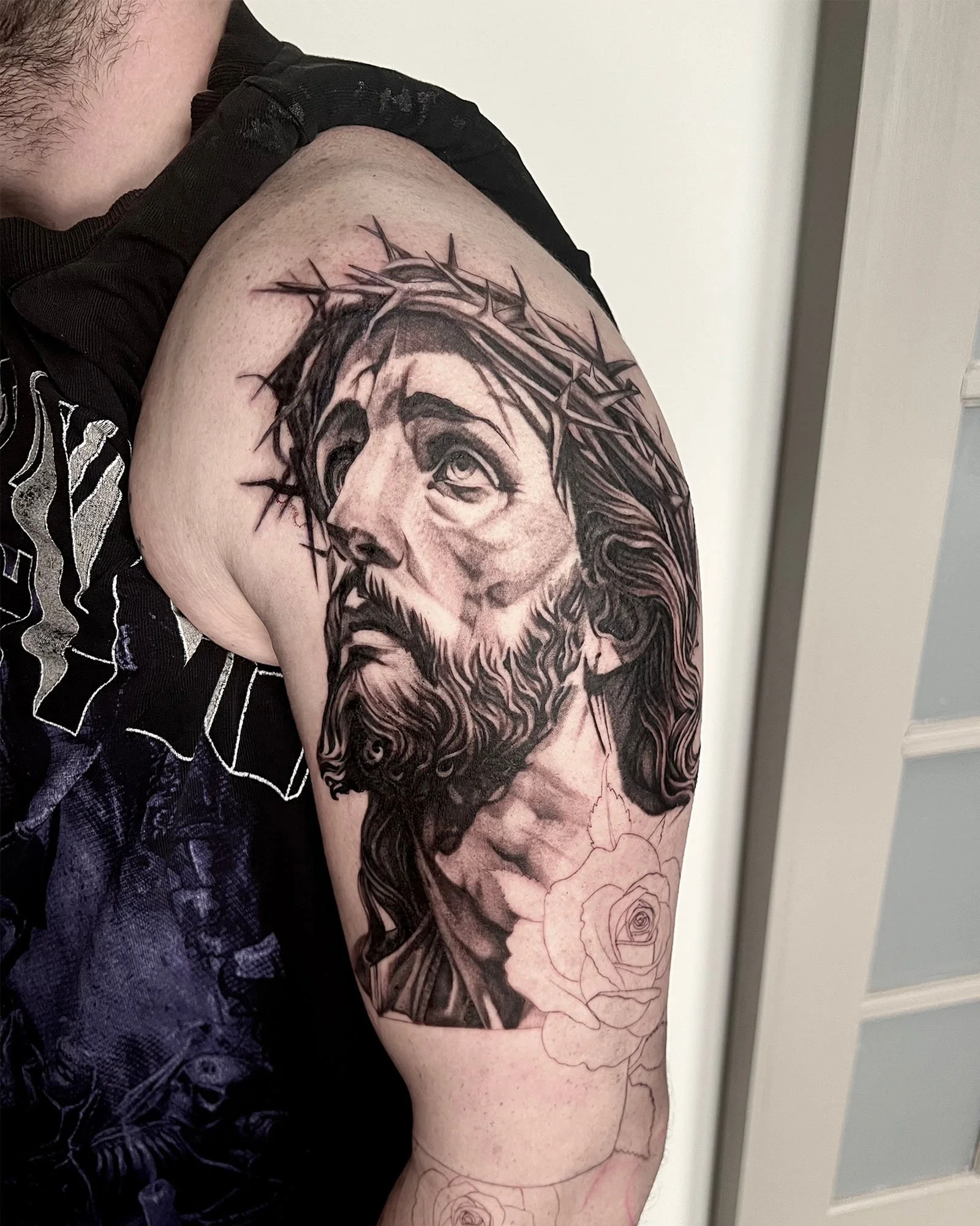 maddie-stanaland-black-grey-photo-realistic-jesus-portrait-tattoo-daphne-alabama.jpg