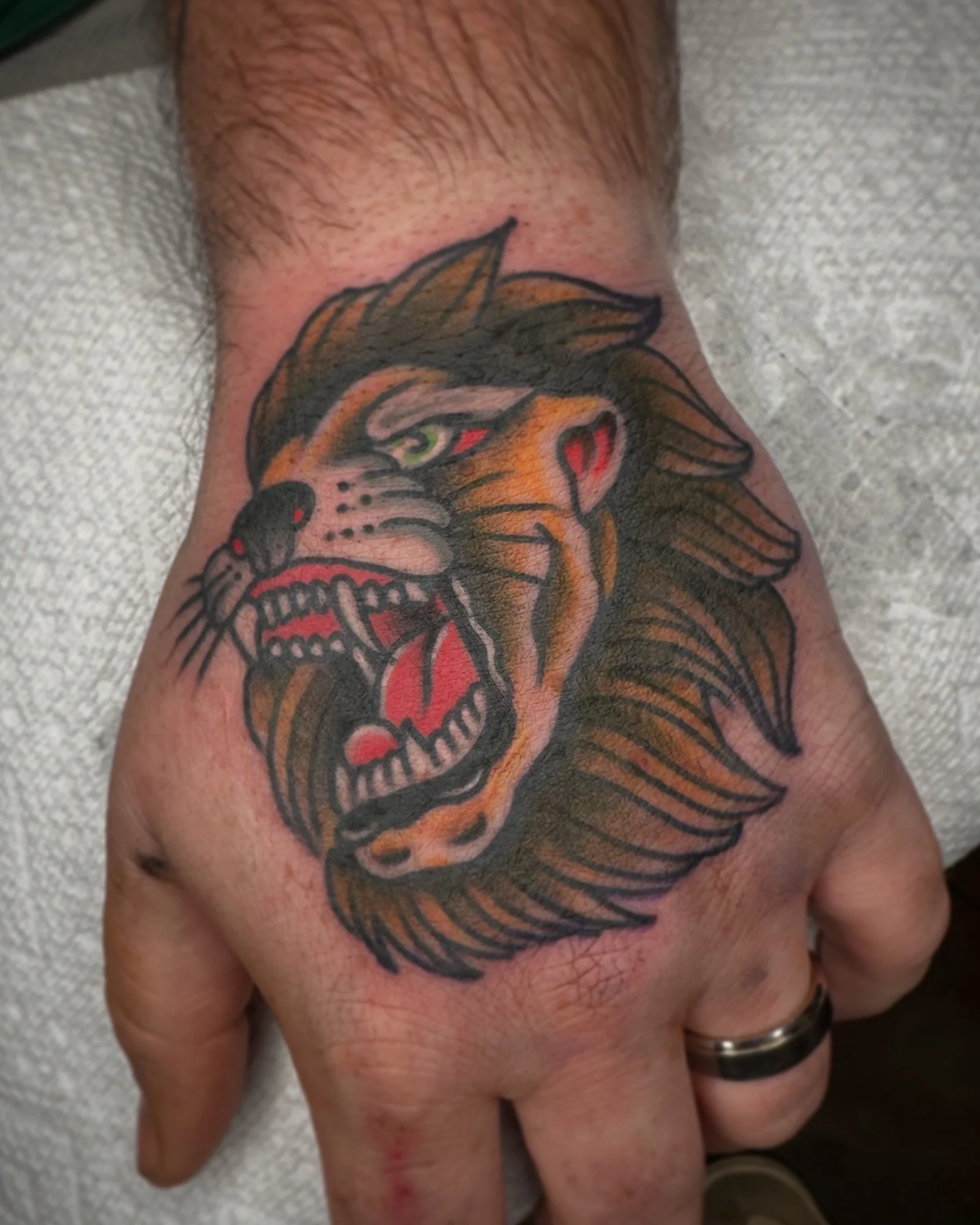 pat-duval-american-traditional-lion-head-tattoo-daphne-alabama.jpg