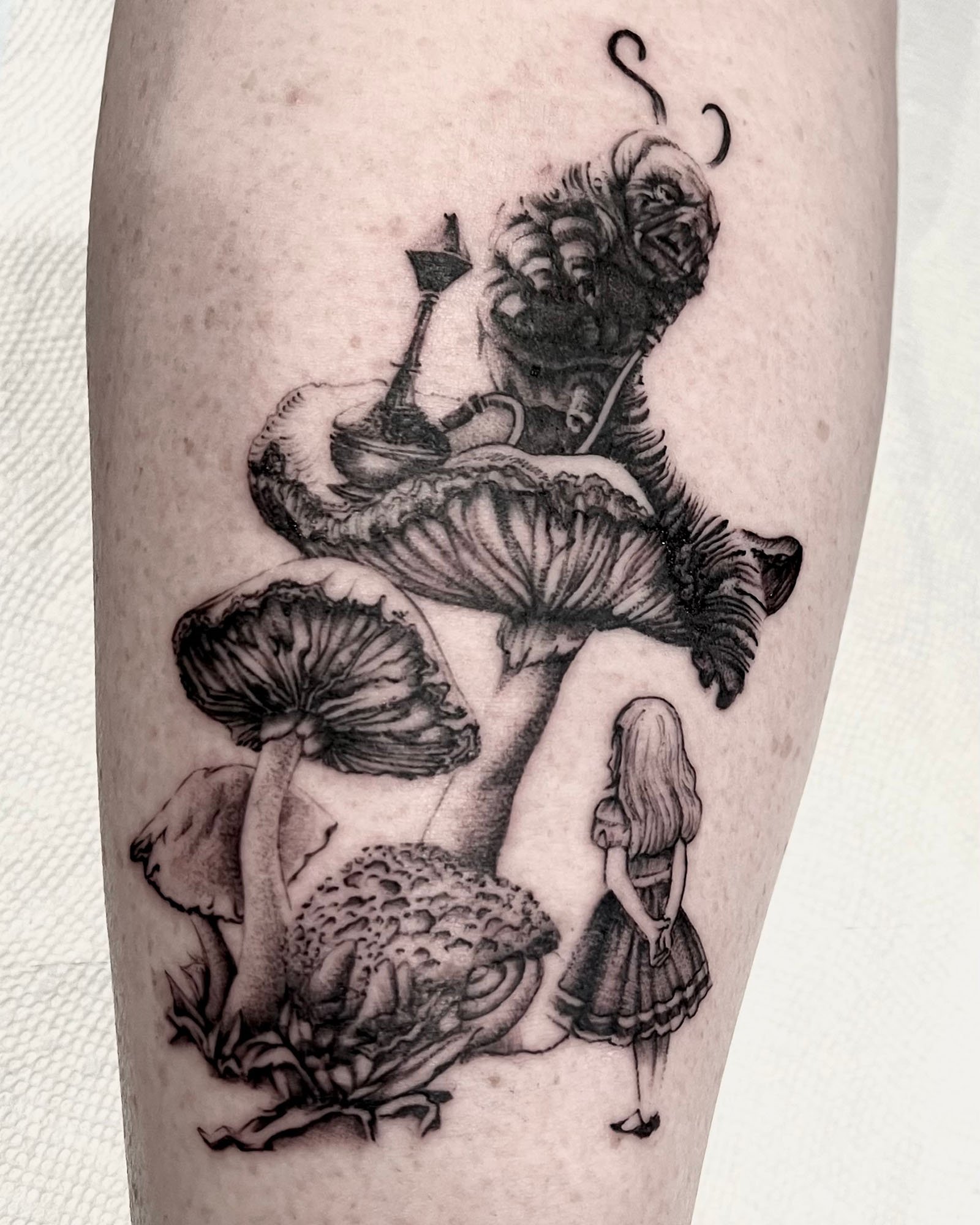 maddie-stanaland-black-grey-alice-in-wonderland-tattoo-daphne-alabama.jpg