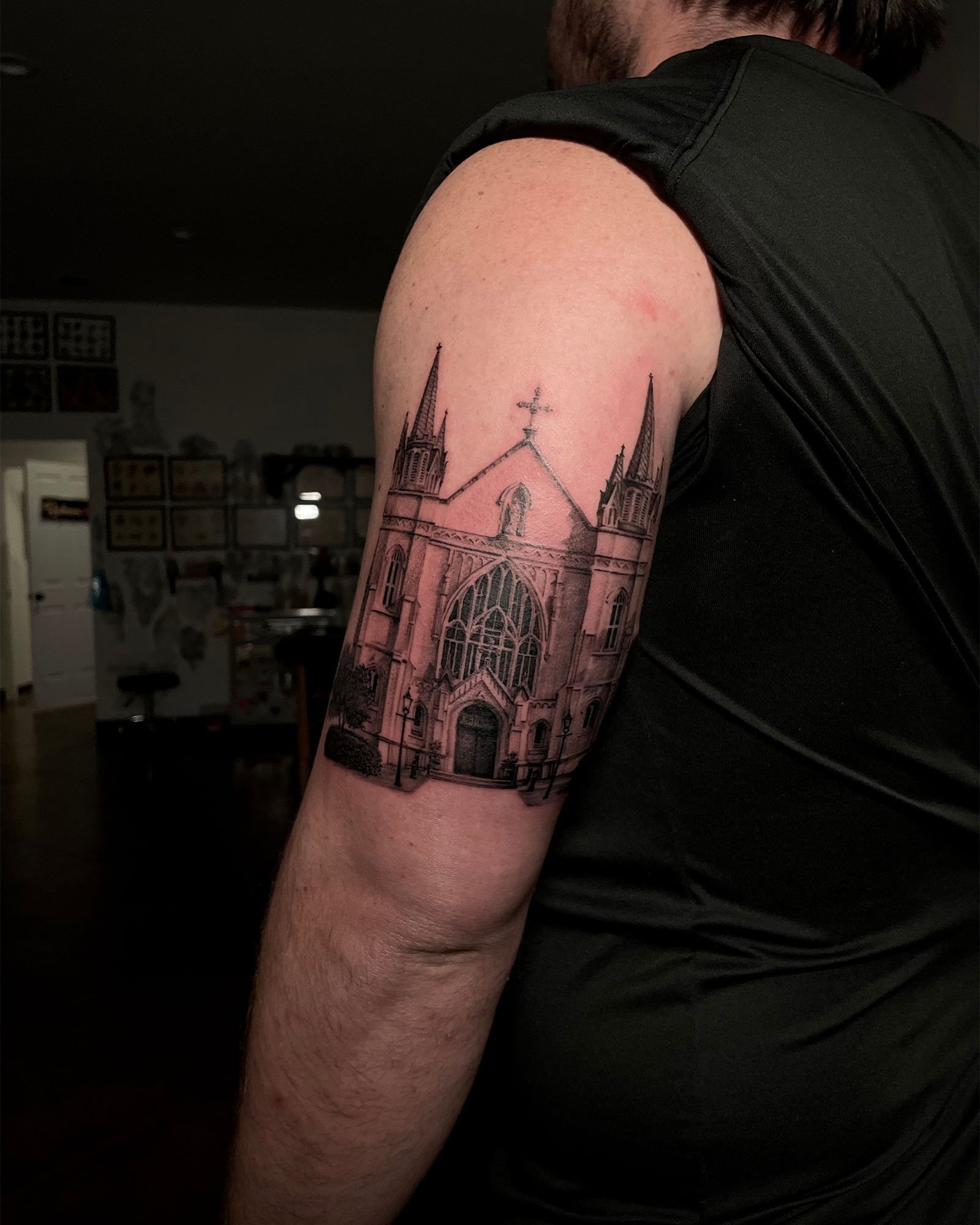 zach—long-black-grey-photo-realism-church-tattoo-daphne-alabama.jpg