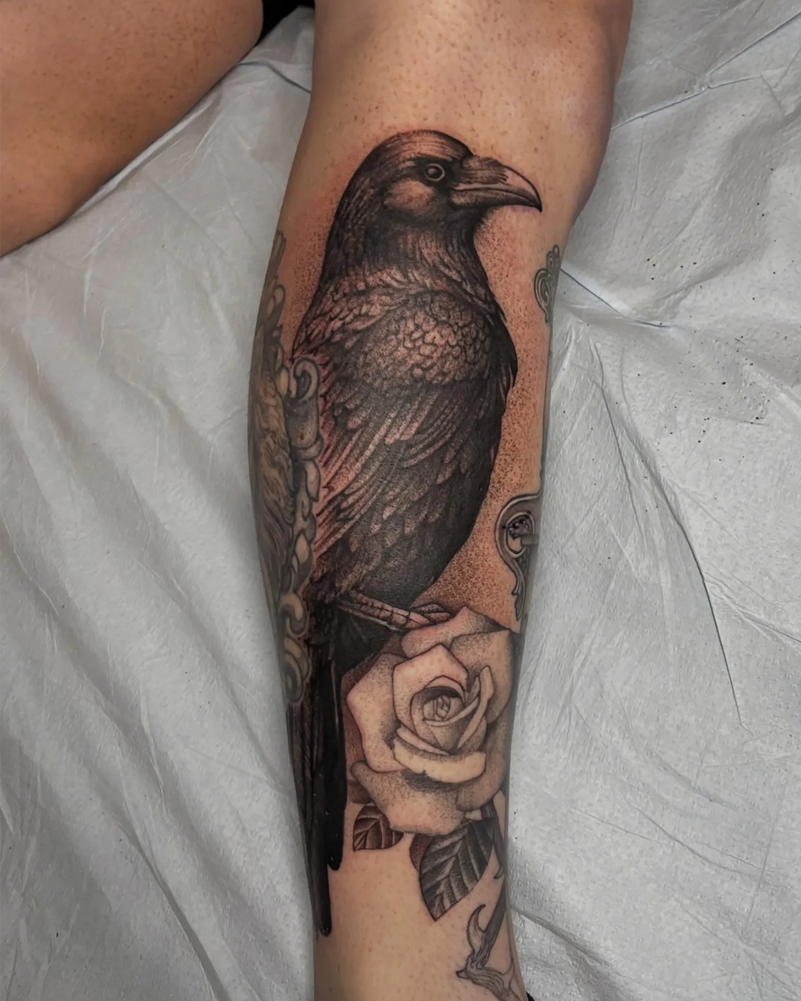 peter-anderson-black-grey-raven-leg-tattoo-daphne-alabama.jpg