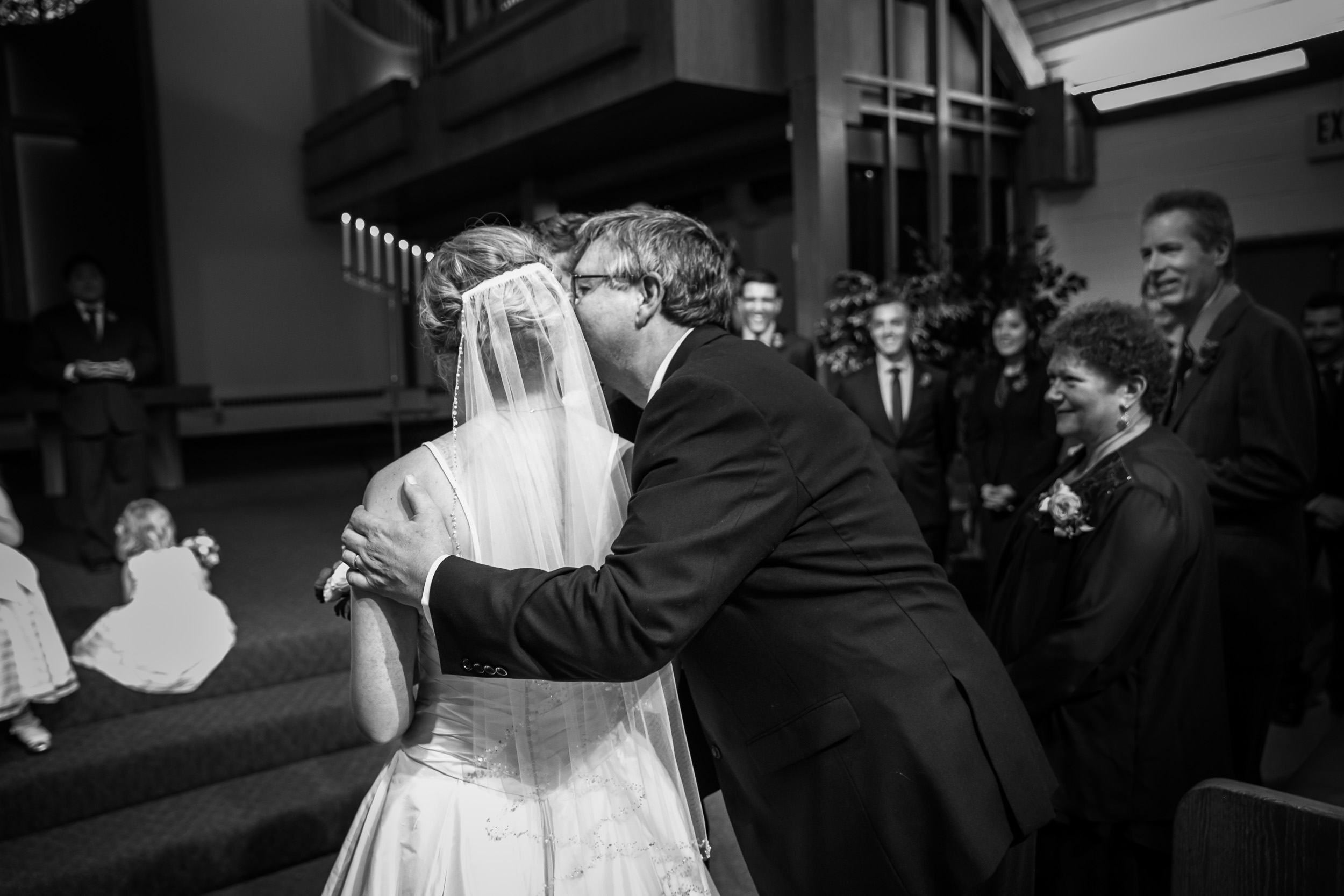 Seattle Community Church Wedding Photography | By G. Lin Photography | Dad kissing bride on cheek