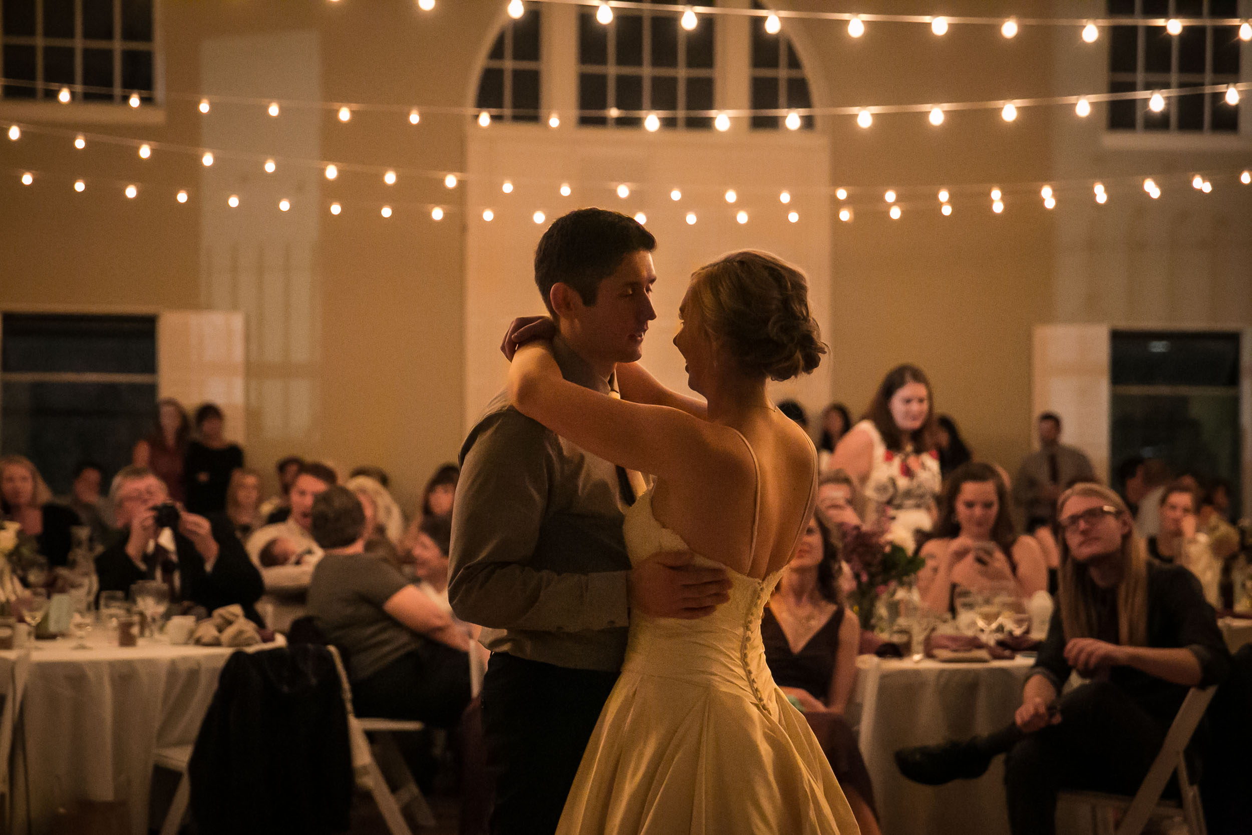 Intimate first dance with low lights | The Hall at Greenlake Wedding Reception Photo | By G. Lin Photography