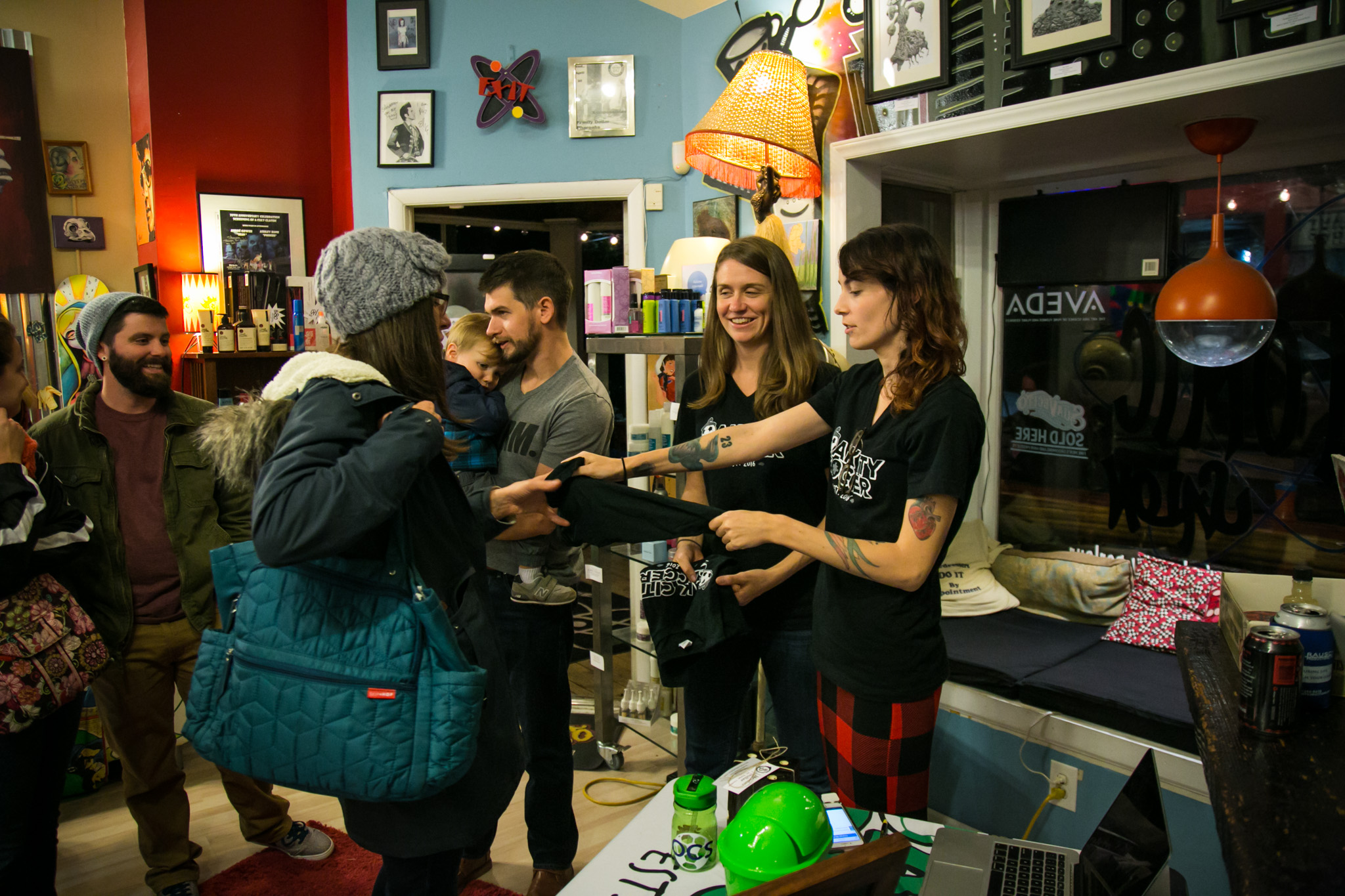 Raleigh Event Photographer | G. Lin Photography | Guests purchasing items during event