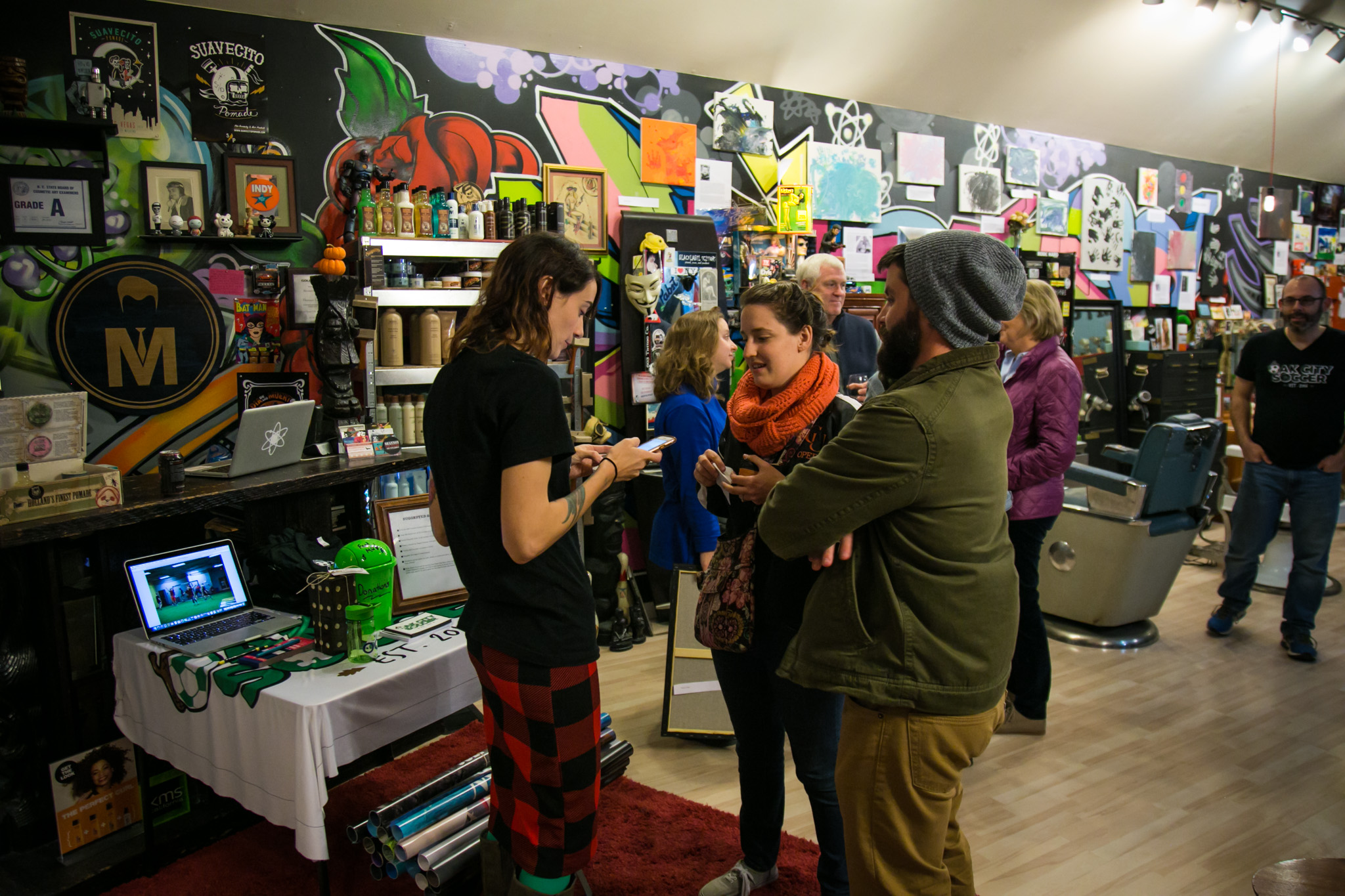 Raleigh Event Photographer | G. Lin Photography | Woman doing a transaction inside salon