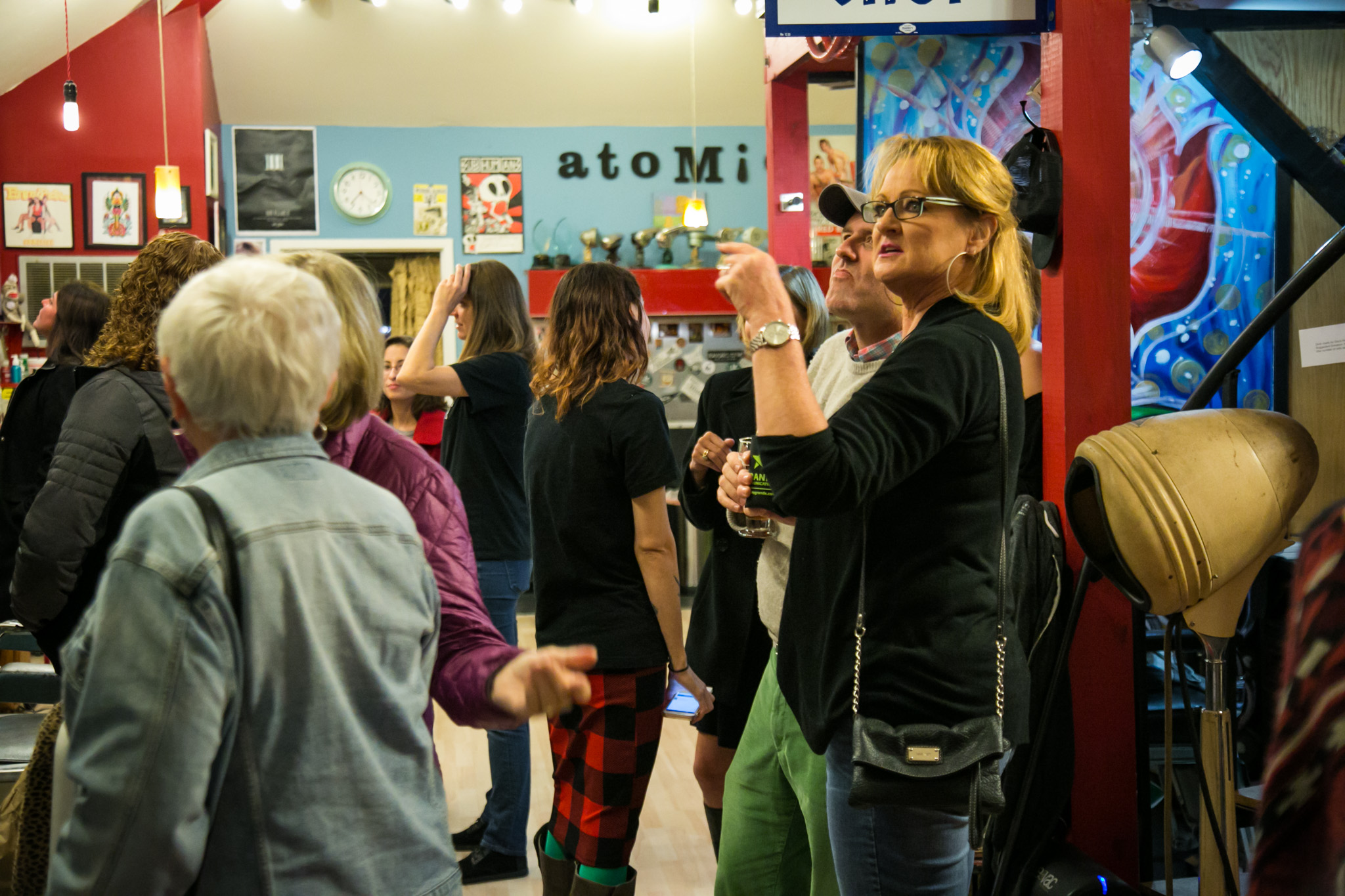 Raleigh Event Photographer | G. Lin Photography | Guests looking at art work