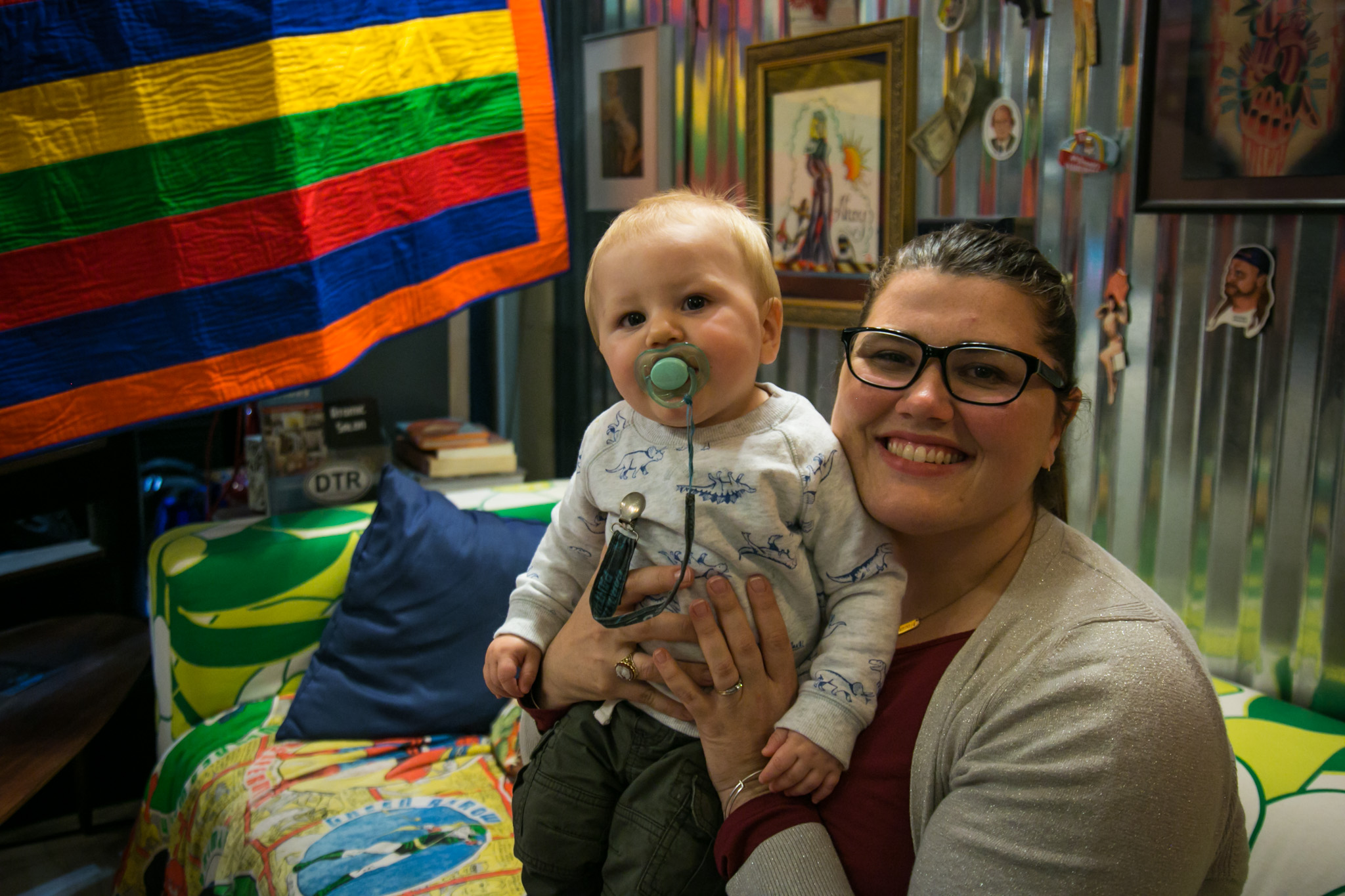 Raleigh Event Photographer | G. Lin Photography | Mother holding baby inside the shop