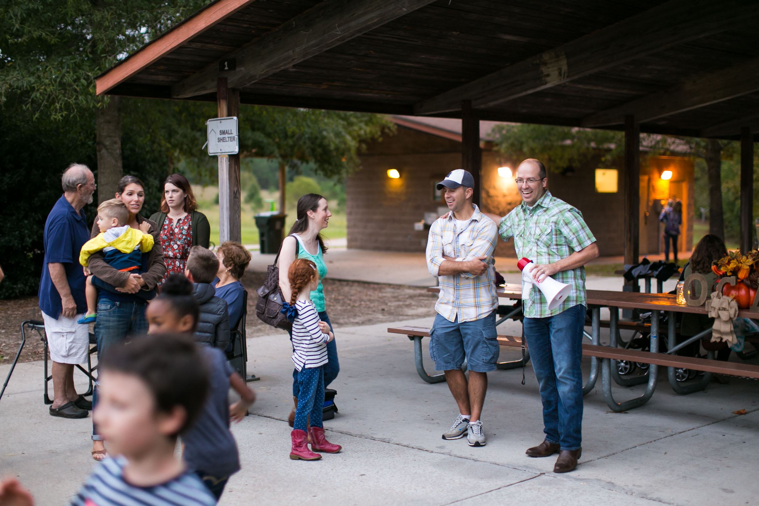 Raleigh Family Photographer | G. Lin Photography | People standing in front of picnic shelter