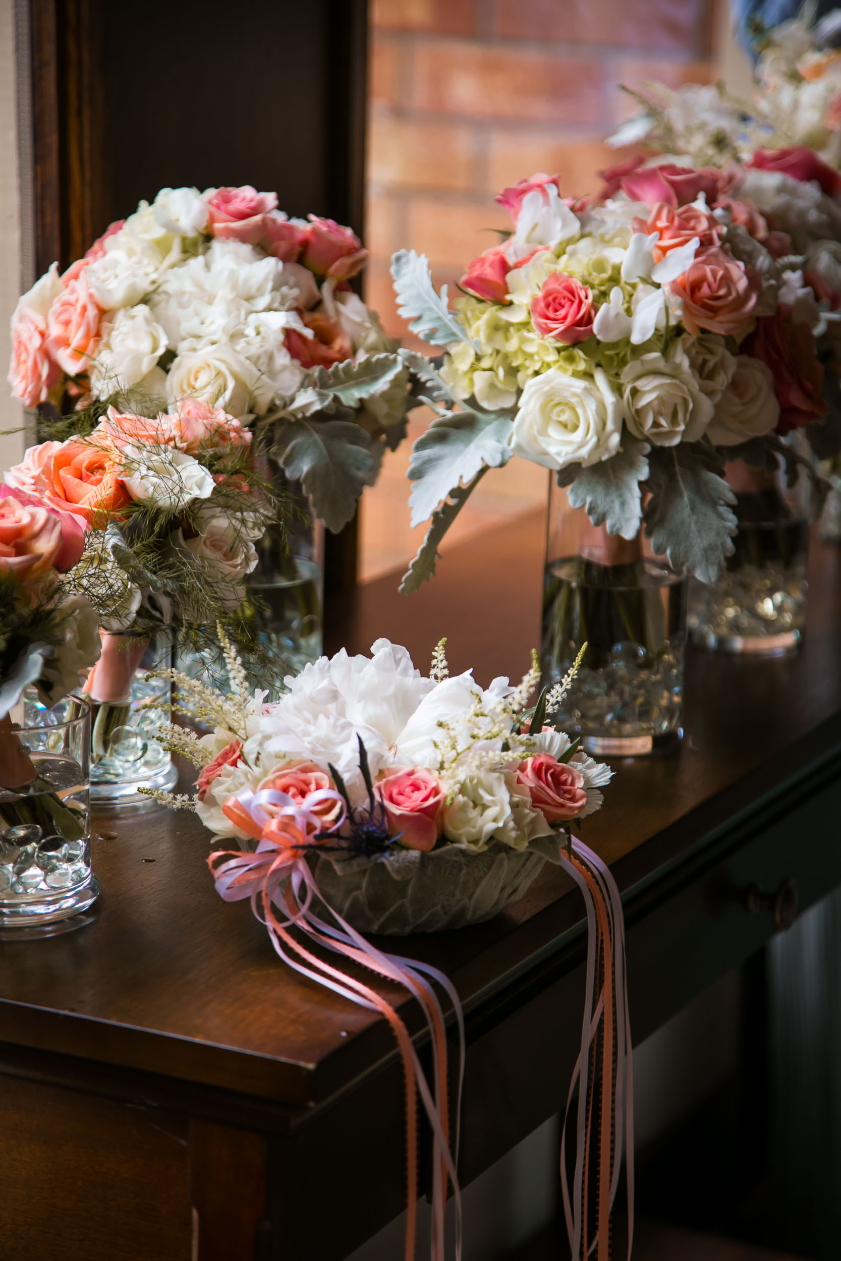 Raleigh Wedding Photographer | G. Lin Photography | Flower arrangement on table at church