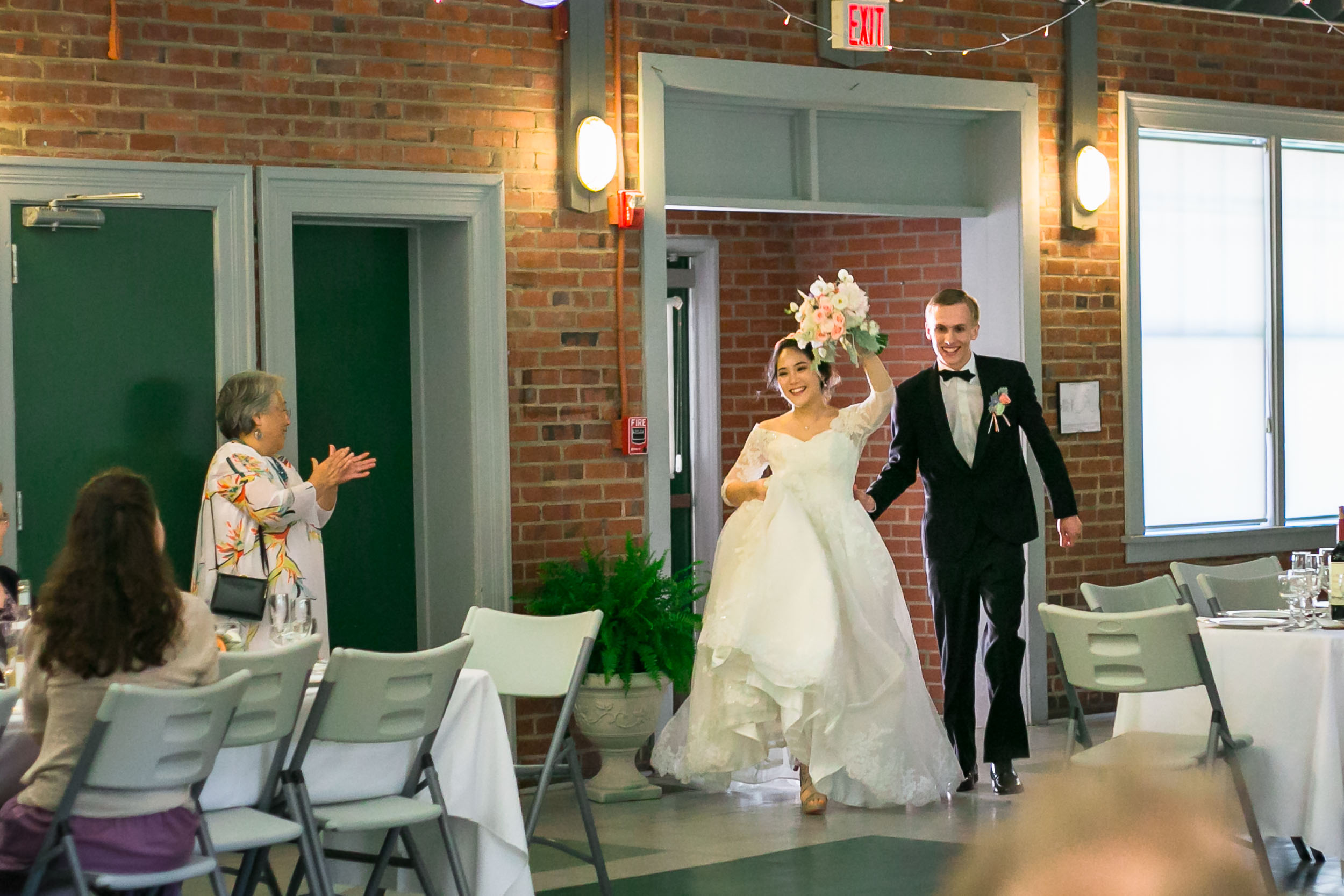 Raleigh Wedding Photographer | G. Lin Photography | Bride and groom entering the reception