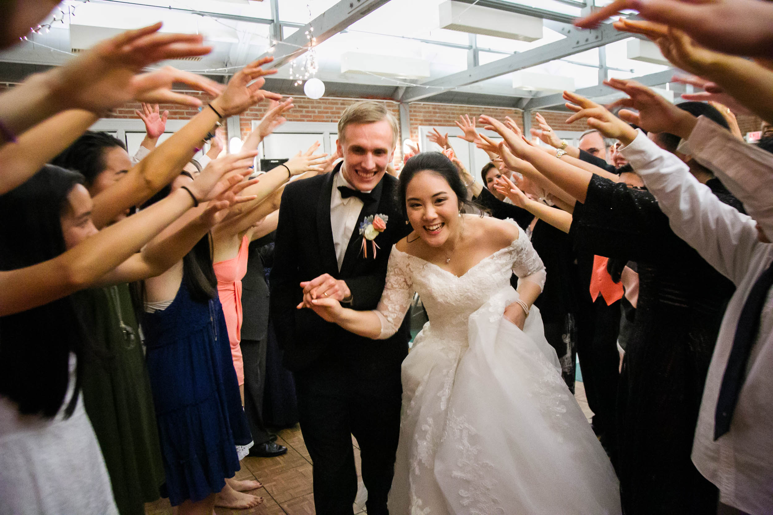 Raleigh Wedding Photographer | G. Lin Photography | Bride and groom exiting wedding