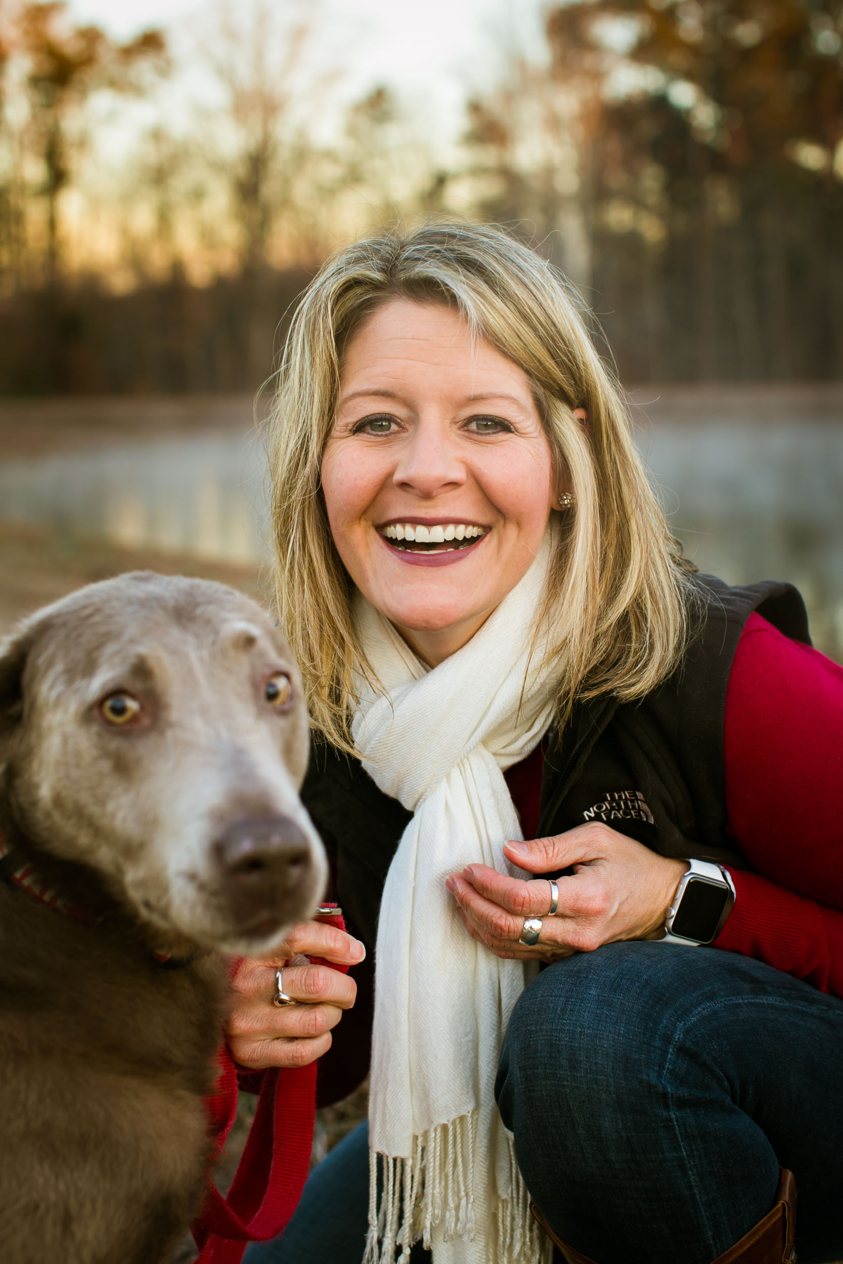 Durham Family Photographer | G. Lin Photography | Woman and dog smiling at camera