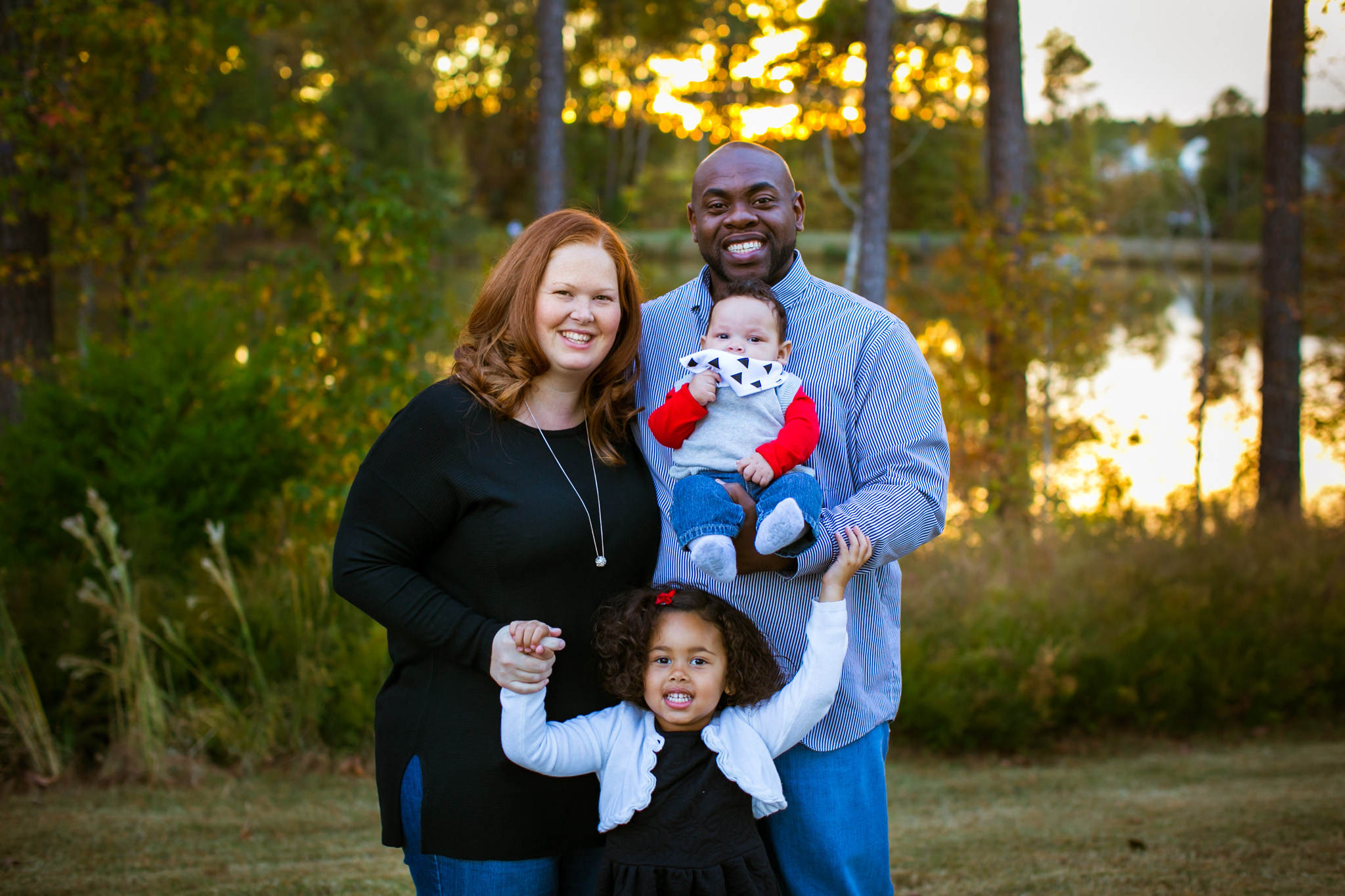 Durham Family Photographer | G. Lin Photography | Family smiling at camera at park