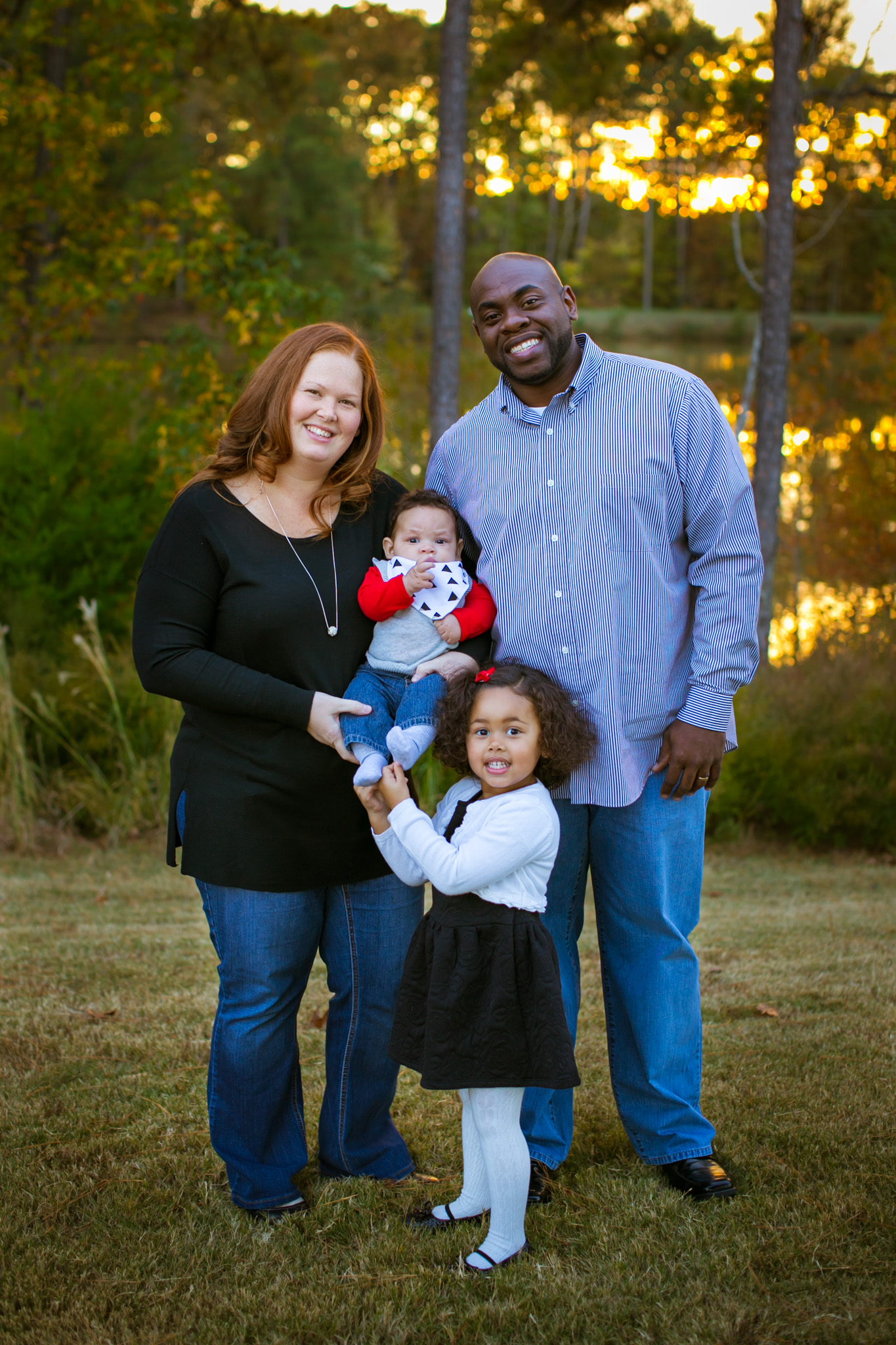 Durham Family Photographer | G. Lin Photography | Family of four standing in front of lake