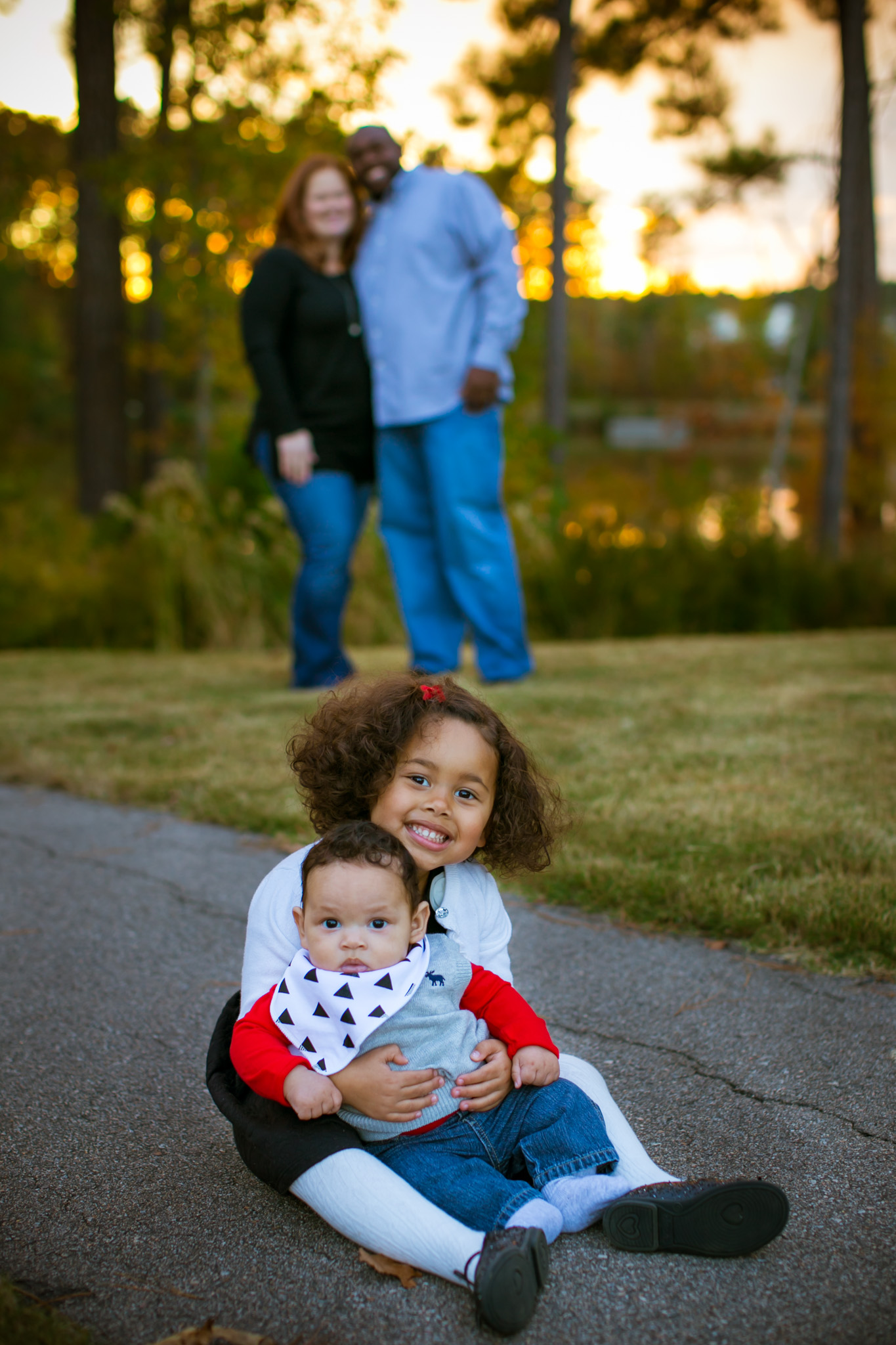 Durham Family Photographer | G. Lin Photography | Children sitting on ground in front of parents
