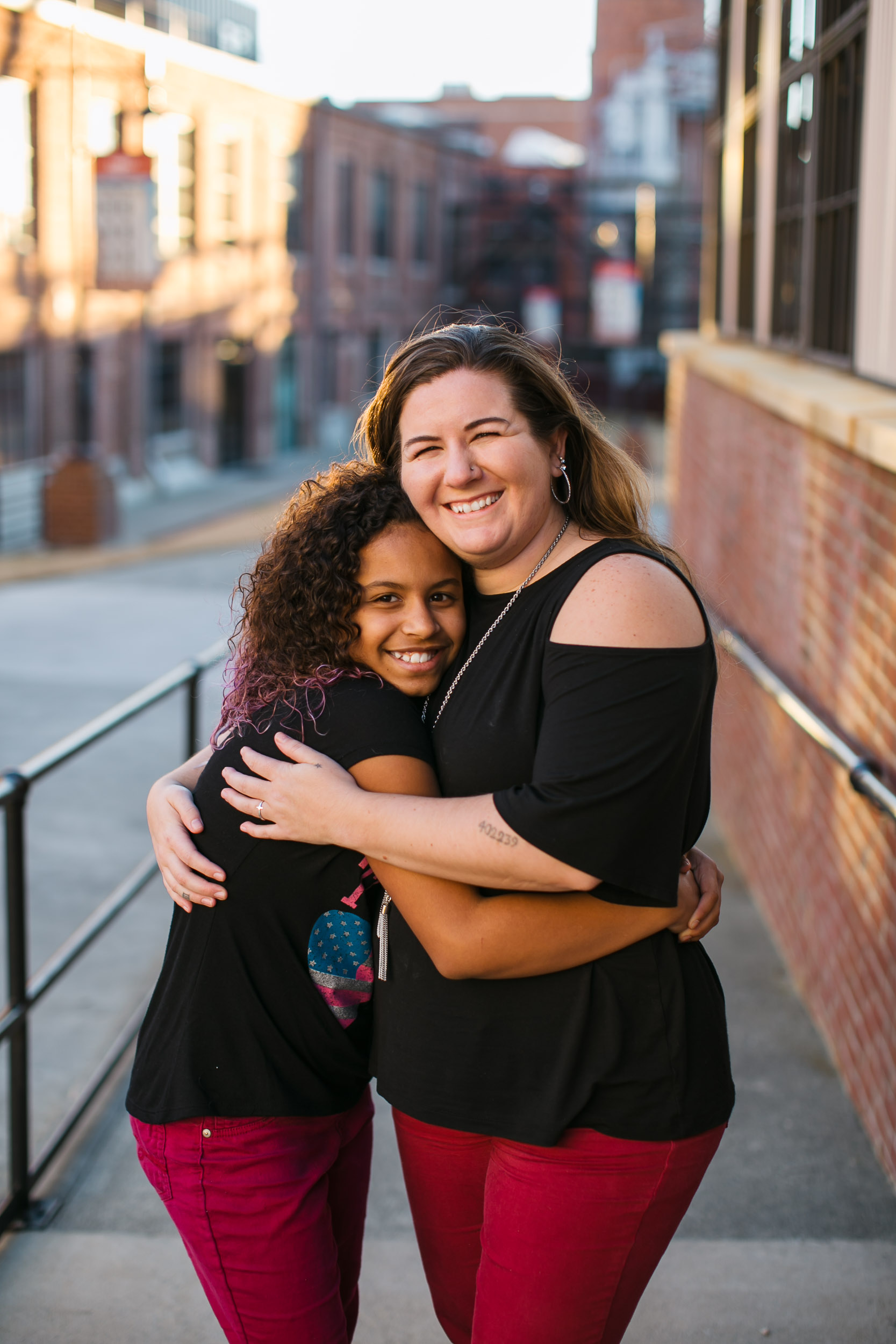 Durham Family Photographer | G. Lin Photography | Mother and daughter hugging and smiling